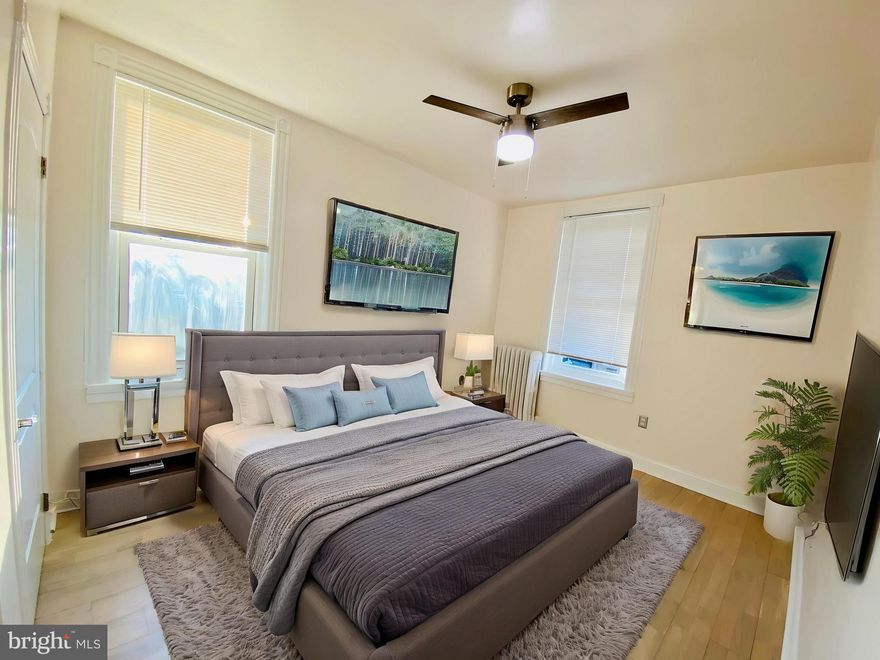 RARE OPPORTUNITY to own this unique, beautiful & professionally remodeled large & spacious DETACHED TWIN DUPLEX (2-Units) in the Southwest Philly with a brand new AMAZON WAREHOUSE 1 BLOCK AWAY! EVERYTHING IS BRAND NEW FROM TOP TO BOTTOM! Take advantage of the opportunity before it's gone! This DUPLEX is luxuriously designed! Seller has recently newly renovated entire 1st & 2nd floors throughout the property w/ fully upgraded & modernized materials & décor in 2021! This DUPLEX features a TOTAL of 4 bedrooms & 2 Full Bathrooms with laundry in each Unit, and there's a very long driveway that can fit up to 6 cars! UNIT #1: Consists of 2 Bedrooms & 1 Full Bathroom. Entire Unit #1 has nice & wide hardwood floors all throughout the unit! You can enter Unit #1 from the front or the rear of the property. Unit 1 enters into a good-size modernized Eat-In Kitchen w/ granite countertop, CNC cabinetry, recessed lights, refrigerator & stainless steel appliances (Stove/Range, Hood Range that vents to the exterior, & microwave oven)! Front Bedroom has ample closets, ceiling fan with lights & an enclosed front porch. Unit 1 has a good size Full Bathroom that consists of a single vanity, toilet, spacious Stand-Up Shower w/ nice sliding glass doors, & large tile floors & tile shower walls! This Unit 1 has a spacious rear bedroom w/ ceiling fan & lights, & a rear door to exit to the large-size backyard! Entire Unit #1 utility is all run by electric. Unit 1 has a BRAND NEW Rheem Electric Hot Water Heater & a NEW HVAC Forced Hot Air Heating System . 
Plenty of natural lights shining T/O entire home to help you save on energy bills! Then on a separate entrance inside the property, you’ll enter Unit 2 by going up the stairs &  into a Modernized & Fully Upgraded large Kitchen that features nice CNC cabinetry, Granite Countertops, recessed lights, ceiling fan w/ lights, wide hardwood floors, Deep Stainless Steel sink & faucet, & Stainless-Steel Appliances (Stove/Range, Hood Range that vents to the exterior, & microwave oven), as well as a separate Granite Island to make it a nice & perfect Eat-In Kitchen! There is also Washer & Gas Dryer in this Unit! Unit 2 features 2 spacious Bedrooms! ENTIRE 2nd Floor have BRAND NEW beautiful hardwood floors all throughout! Every Bedroom has a ceiling fan w/ lights & ample closets! Main Hallway Full Bathroom on 2nd Fl. has a modern-look that boasts BRAND NEW large tile floors, Single Vanity, toilet, & shower tub w/ sliding glass doors & tile walls! Unit #2 has gas heat radiators & NEW Gas Hot Water Heater! Entire Property has BRAND NEW Flat Rubber Roof, dry walls, windows, doors, HVAC Heating system, Hot Water Heaters, plumbing, electrical, & freshly painted all throughout! Start off your new home w/ this very low maintenance home! Unit 1 is currently being rented for $1,300/month on Month-To-Month lease. Unit 2 is projected to bring in another $1,300/month in rental income! TOTAL Rental can potentially bring in $2,600/month! Seller pays Water. Turn-Key opportunity w/ this large DUPLEX to collect Rents from Day 1! OR Live in 1 unit and collect rent on the other! The possibilities are endless! Septa bus / trolley stops & public transportation are easily accessible in the area! Close to supermarkets, stores, gyms, restaurants, parks & minutes from Penrose Plaza Shopping Center. Easy access to all major highways! Minutes away from Philadelphia's International Airport, Philadelphia's Auto Mall, Drexel University, University of the Sciences in Philadelphia, University of Pennsylvania, Center City & Penns Landing! PRICED VERY COMPETITIVELY TO SELL!! GREAT for First-Time Homebuyer or Investor lookin for turnkey income-generating property from Day 1!!! Get an offer in quickly before it's gone! Available mortgage financing w/ very low down payment & potential lender's grant up to $8,000!! Limited Time Offer Only!!! Ask me how! ***INCLUDES 1 YEAR American Home Shield HOME WARRANTY