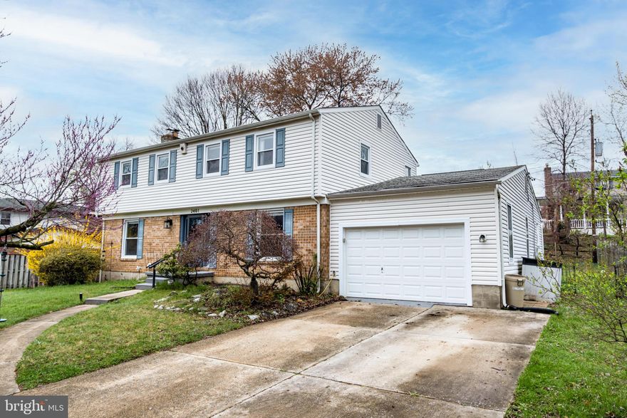 This charming Colonial home in the desirable Coachford neighborhood offers a perfect blend of comfort and style. With 4 spacious bedrooms and 2.5 baths, with separate shower in the laundry area. The main level features include recently renovated kitchen with lots of cabinet space, SS appliances, granite counter tops, pantry and new flooring; living room with fireplace and built in bookshelves; full dining room with built in cabinets; separate office space; large family room that leads to fully fenced in backyard. 1/2 Bath on main level newly renovated.  HVAC and relined chimney new in 2021. Attached oversized garage and ample off-street parking add convenience.