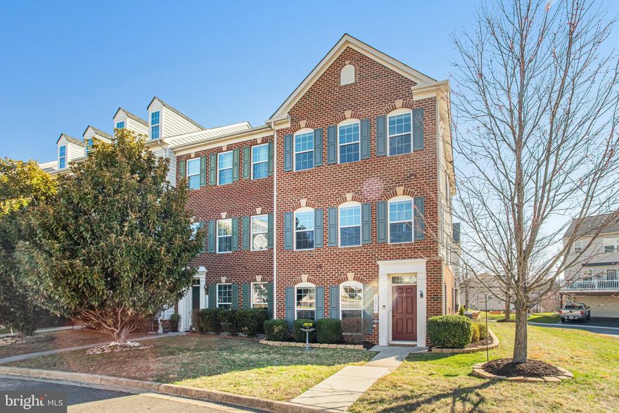 Location, Location! Hurry this impressive brick, end unit, townhouse with 2 car garage won’t last long. Welcome home to your 3 bedroom, 2.2 bath plus an office/bonus room with 3 levels. If you enjoy entertaining, gathering with family and friends, then this house is for you.
Walk through the front door, the first thing that you will notice is the large foyer and the den off to your left with a half bathroom. This room could be converted into a bedroom with the addition of a door. There is also a laundry/utility room that leads through to the spacious 2 car garage.
Head upstairs and note the beautiful hardwood floors that continue throughout the entire main level and stairs. The open living concept is the first thing that wows you as you come off the steps. The living room features an electric fireplace, large windows that let in a lot of natural light and a powder room for guests nestled around the corner. Turn and check out the large, gourmet kitchen, featuring hardwood floors, upgraded granite countertops, a spacious island, a generous size pantry. The stainless appliances include a gas stove, a Kitchen Aide dishwasher that was installed in 2022, and a new garbage disposal was also installed in 2022.
There is plenty of space for a large dining room table, in the combo kitchen, dining room area. It doesn’t stop here, walk out on to your wonderful large back deck that was replaced in 2022 with Trex, so you have no maintenance worries. The glass storm door to the deck comes with built in screen so you can enjoy fresh air on nice days.
Head upstairs and you have 2 guest bedrooms, a guest bathroom and the large Primary bedroom which features vaulted ceilings, large windows, a walk-in closet. The ensuite bath is complete with upgraded tile, double sinks, a large Roman style shower with Dual shower heads and a built-in bench seat.
The HVAC and AC compressor were replaced in 2020, new fire alarms in 2024, and a new driveway in 2024.        
 Furniture in Living Room, Dining Room Table and chairs, Bedrooms,  Patio seating and storage can convey if desired.

You are close to shops, restaurants, grocery stores, Potomac Mills Mall, Costco, etc. For commuting you have easy access to Prince William Parkway, Old Bridge Rd, and I95, local commuter lots and park and ride lots nearby. The HOA amenities include a community pool, basketball court, walking trails, a community center with a fitness room, and a tot lot. You are close to State parks, local marinas, golf courses, hiking/biking trails including the hardscape trail that parallels Prince William Parkway all the way to Manassas.