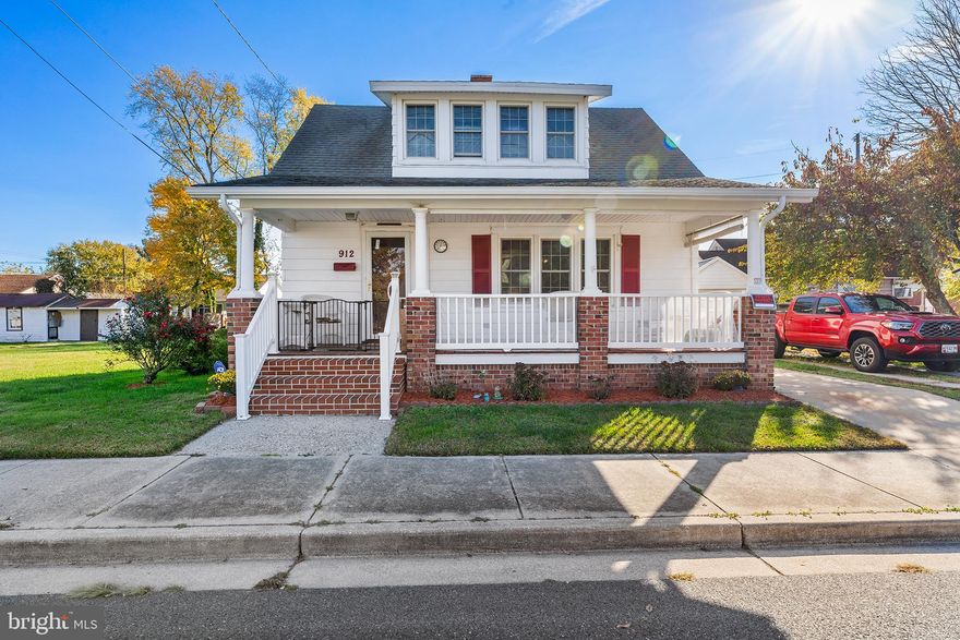 Welcome home to this charming and updated 2 bed, 1.5 bath cape cod nestled on a quiet street just moments from downtown Cambridge. This delightful Cape Cod home is a true gem, situated on a double lot that offers ample space. Enter through your covered porch, which is not only the perfect place to relax but is a also space for reflection, a gathering spot for friends and family, and a space for quiet contemplation. Whether it's enjoying your morning coffee, reading a book, or watching a summer rain shower, this covered porch is designed for moments of pure contentment. Step inside, and you'll be greeted by a cozy and welcoming updated interior with beautiful hardwoods, high ceilings and an abudance of natural light. The open floor plan seamlessly connects the living room, dining area, and kitchen, creating an inviting space for family gatherings and entertaining. The updated kitchen is perfect for hosting gatherings of any size. The upper level features two comfortable bedrooms that share an updated full bath, with plenty of space for family members or guests. This turn key home also includes recent replacement of windows, gas heat and central air conditioning. One of the highlights of this property is the spacious outdoor setting which includes a fenced backyard providing the ideal setting for activities like sports, picnics, and barbecues and is ready for kids and pets. Two dedicated driveways and detached single car garage parking offers for ample parking. This home is just moments from downtown Cambridge for shopping, waterfront dining, and entertainment and a short drive to Blackwater Wildlife Refuge for outdoor enthusiast! Welcome home!