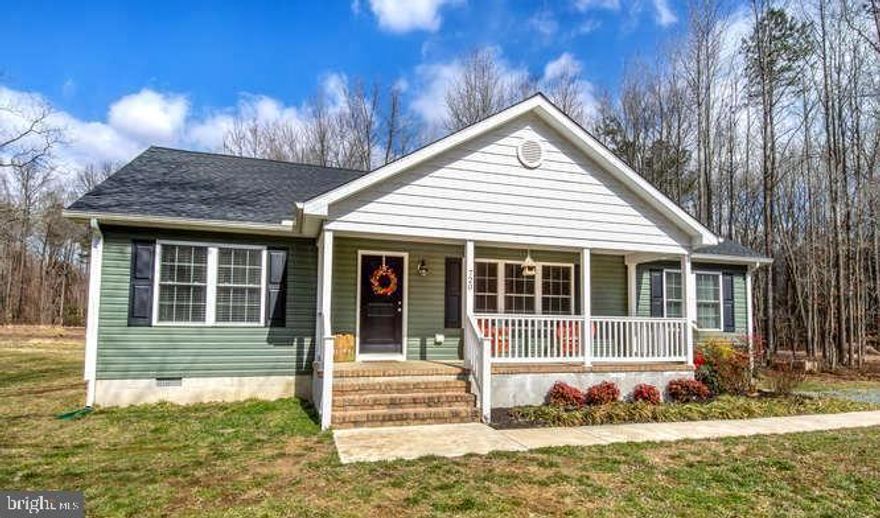 COME SEE THIS SUPER ADORABLE & AFFORDABLE HOME SWEET HOME!! Like NEW- Stick Built in 2017 & Ready to move right in! The Perfect Size with 3 Spacious Bedrooms & 2 Full Bathrooms. Amazing Covered Front Porch which is great to sit back, relax and listen to nature... all of this on 1.25 peaceful acres of land!  Large Upgraded Kitchen with Kitchen Island and Stainless Appliances is nice for entertaining! The all Desired Open Floor plan, beautiful Hardwood Floors and the soaring Cathedral Ceiling will WOW You!! Large Master Suite is sure to please with WALK IN CLOSET & Master Bath with a DOUBLE VANITY and a NEW Upgraded Shower Door! Just a few minutes to Downtown Historic Centreville without the Town Taxes!! Close to Beaches, Sports Fields, Parks, Boat Landing, Restaurants & Schools! USDA 100% Financing available here! Easy commute on 301/50 to Annapolis, Baltimore, DC! DE Beaches and Tax Free shopping a quick drive away! Don't miss out on this fantastic opportunity!!!