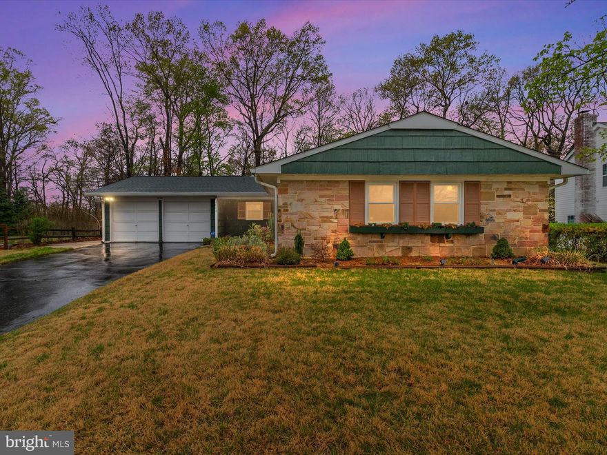 This beautifully updated Buckingham Rancher, located in the sought-after Whitehall at Belair subdivision, sits on an expansive 0.62-acre lot. Offering nearly 2,200 square feet of one level living space. The spacious living room features gleaming wood floors and a wood-burning fireplace, creating a warm and inviting atmosphere. Adjacent to the living area is a hall bathroom and three generously sized bedrooms, including the primary suite with a private en-suite bathroom. At the heart of the home, the renovated kitchen showcases modern 42” cabinetry, stainless steel appliances, and a versatile peninsula countertop, perfect for casual dining and entertaining. The kitchen seamlessly flows into a stunning 24’ x 30’ addition, highlighted by cathedral ceilings and a second wood-burning fireplace. This expansive space provides effortless access to the private backyard, which backs to mature trees and features a floating deck, ideal for outdoor gatherings. Other Notable UPDATES: NEW Architectural Shingle Roof and Updated Electric. Conveniently located near the local schools, Bowie Plaza Shopping Center, and the Whitehall Pool and Tennis Club (membership available), this home offers easy access to Bowie Golf Club, restaurants, public transportation, and major commuter routes, including Route 50, 301, 450, and the Beltway. A perfect blend of modern updates, ample space, and prime location!