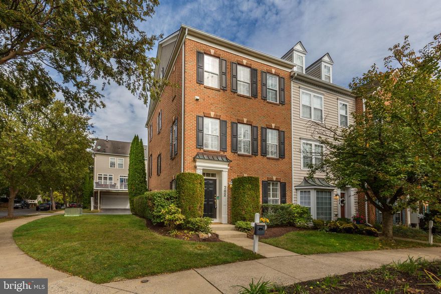 Rarely available brick end-unit, 4-level townhome ideally sited on a peaceful courtyard with lovely views. Thoughtfully updated with high-end style in mind, this home features beautiful flooring, designer paint and wallpaper, custom lighting and closets, plantation shutters, and recessed lighting throughout. The open floor plan offers generous living and entertaining spaces, including a spacious family room that flows seamlessly into the table-space kitchen—perfect for gatherings and everyday living. The kitchen impresses with a large center island, gas fireplace, workstation, and direct access to the rear deck for outdoor dining. The upper levels include a luxurious primary suite with room for a sitting area, a separate loft space ideal for an office or gym, a spa-inspired bath, and a large custom walk-in closet. A flexible lower-level space provides an option for a third bedroom or den. Enjoy all the Lakelands lifestyle has to offer—beautifully maintained grounds, walking and biking paths, playgrounds, pools, and community events—plus easy access to grocery stores, restaurants, and everyday conveniences just minutes away.