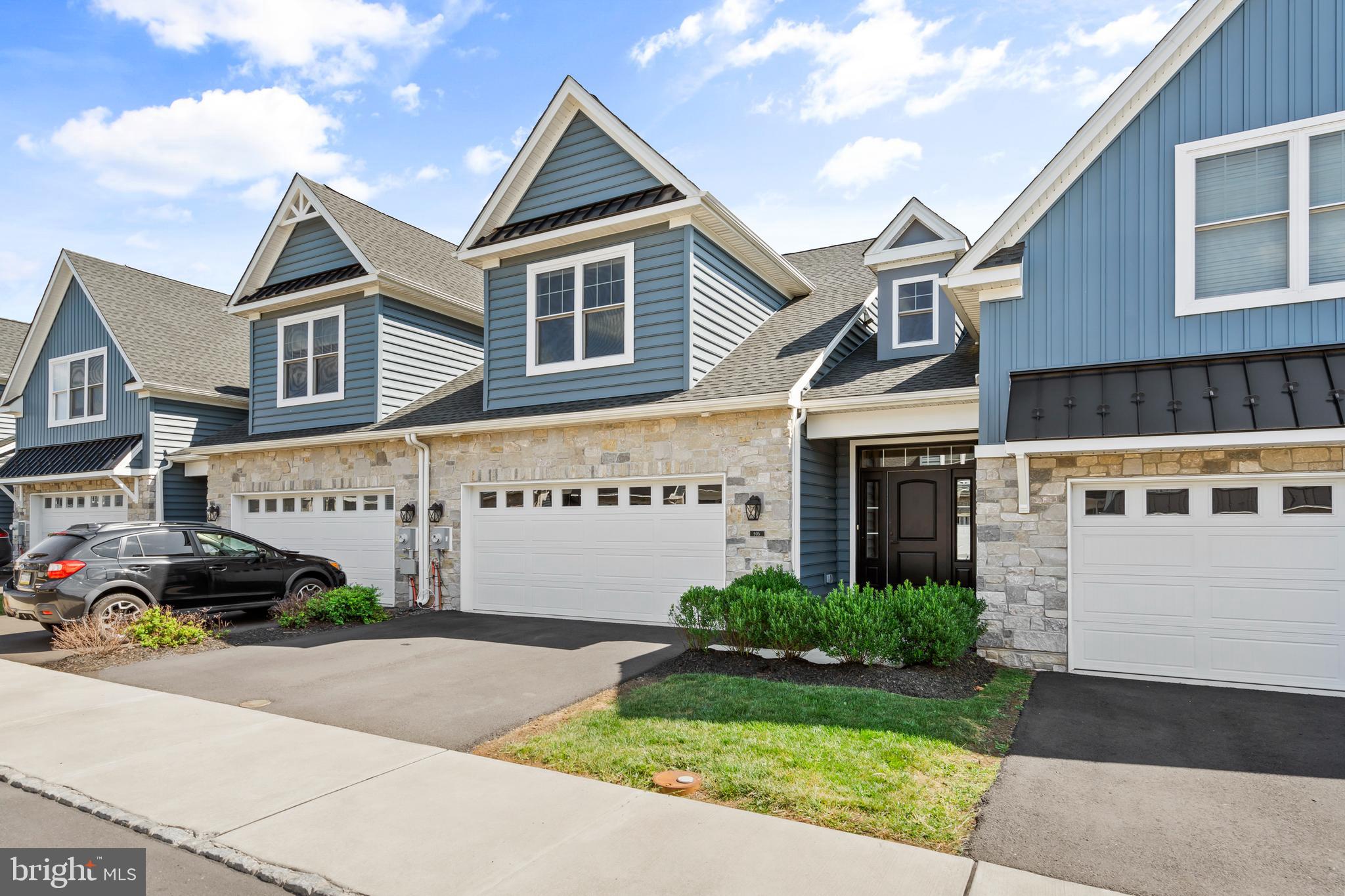 Fabulous 55+ Town home in Prime Location and only a couple years old. Welcome to 905 Holden Court, a rare opportunity to own a nearly-new town home in a small, beautifully maintained 55+ community just minutes from everything you need. This stunning home combines comfort, quality, and low-maintenance living in an unbeatable location. Step inside to find engineered hardwood flooring flowing throughout the main level, leading you into a gourmet kitchen featuring quartz countertops, a large center island, and gas cooking—perfect for entertaining or everyday living. The spacious living area includes a cozy electric fireplace and opens to the home's standout feature: a bright and cheerful sunroom, ideal for morning coffee, afternoon reading, or a peaceful home workspace. Just outside, the patio offers the perfect place to enjoy the fresh air. The main floor primary suite includes two closets and a luxurious en-suite bathroom with double vanity sinks and marble flooring. A powder room and a laundry room conveniently connecting to the two-car garage complete the main level. Upstairs, a versatile loft area provides additional living space, perfect for guests or hobbies, and is flanked by two generously sized bedrooms and a full bath. Enjoy the ease of maintenance-free living in a community designed for comfort, with shopping, dining, and transportation just minutes away and easy access to major highways. Don’t miss this move-in ready gem at 905 Holden Court where lifestyle and location come together effortlessly!
