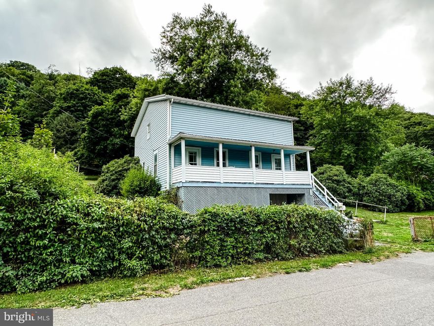 Serene Mountain Living! This Lonaconing home could be a fantastic primary residence or the perfect weekend-getaway retreat! Complete with 3 Spacious Bedrooms, 1.5 Bathrooms, Main Level Laundry, a Private Backyard (Nearly an Acre!!), a cozy front porch, rear deck, and SO MUCH MORE! You'll LOVE the firepit, the woods, and being surrounded by nature! But don't take my word for it... come and see it for yourself! Make your appointment today!