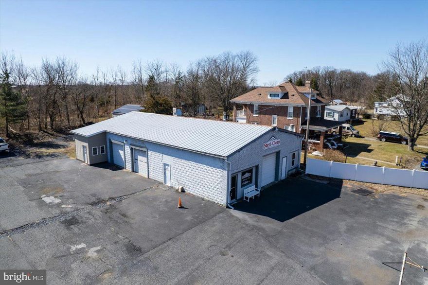 Is your business growing? This property is zoned "Baltimore Pike Corridor" which offers many options for potential use. The office area has been updated with a nice modern style. There is on site laundry, an air compressor system, natural gas heating, 1.5 baths, and three garage bays (one 10x10 and two 9x9). Come by and see all that this property has to offer. The owner is a licensed realtor.