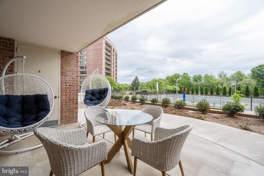 Welcome to this beautifully staged and updated condo, the largest 2-bedroom, 2-bath model in the highly sought-after Crystal Park community. On the market for the first time in 25 years, this home has been lovingly maintained by its original owners. It features one of seven coveted private terraces in the building overlooking the pool, offering beautiful views of the private swimming pool and common green space from every window. This residence provides a serene, oasis-like setting, making you feel as though you're in the countryside while being just moments from Reagan Airport.

The home boasts a custom kitchen with granite countertops and stainless-steel appliances, luxurious baths, designer paint, and a new heat pump/air conditioning unit installed in 2022, among other upgrades. Enjoy the convenience of ample closets, an extra storage unit on the Mezzanine level, and two designated adjacent underground parking spaces.

Luxury amenities include secure building access, 24-hour security, an exercise room, a recently updated fabulous inground pool, a party room, a billiards room/library, and a gym. The condo fee covers water usage and air/heat usage in all common areas…it does not include heat/air usage inside the unit.  Situated in the heart of National Landing, this home is just a short walk to the METRO, shopping, and fabulous restaurants, as well as the Pentagon, Pentagon City Fashion Center, Pentagon Row, and Costco—all within walking distance. Nearby attractions include Whole Foods, Amazon Fresh, Long Bridge Park, Long Bridge Aquatics & Fitness Center, National Landing Water Park, Mount Vernon Trail, and more. Additionally, a Metro bus stop is conveniently located on Crystal Drive and 18th Street, with a Metro Train Station currently under construction at the corner of 18th Street and Crystal Drive.

The Community is Pet-Free, but welcomes ESA and Service Animals.

This is an excellent opportunity to own a piece of paradise in a great building with a rarely available floor plan in excellent condition. Don't miss out on this unique opportunity!