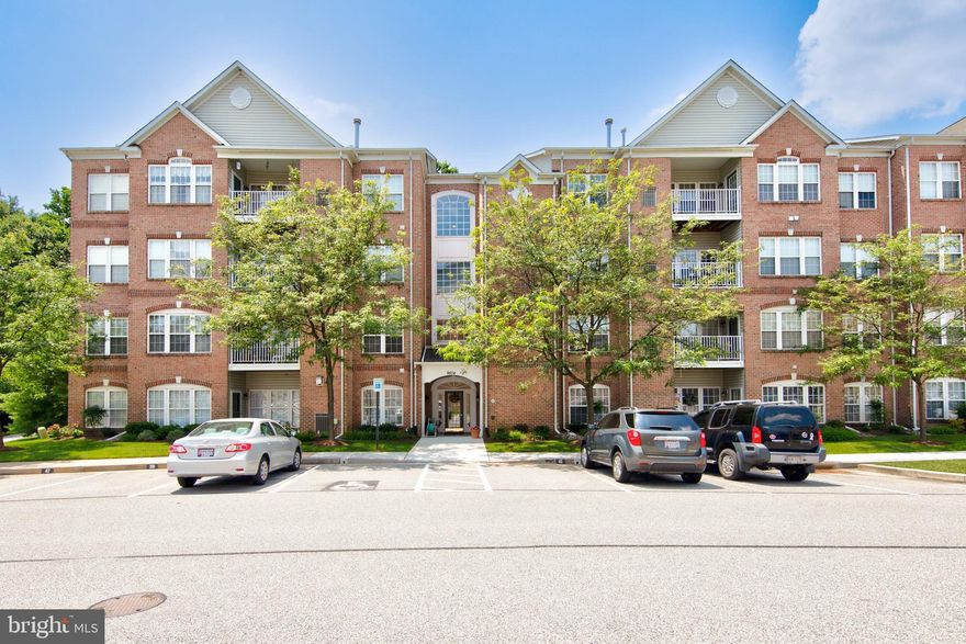 Gorgeous penthouse condo in Perry Hall Farms with cathedral ceilings, spacious living room with gas fireplace, separate dining room with chair rail, crown moldings & chandelier. Updated kitchen with granite counter tops and glass tile backsplash, attached breakfast room that has access to the balcony with storage. Vaulted ceilings in the spacious primary bedroom with bonus sitting area & 10 x 8 walk-in closet. Attached updated primary bath has a vanity with sitting area, tile floor, standup shower & linen closet. Large 2nd bedroom and main bath, laundry and storage room has everything you need on one level! Secured front entrance with intercom and elevator makes this easy living!  Jogging/walking path, close to shopping and entertainment.