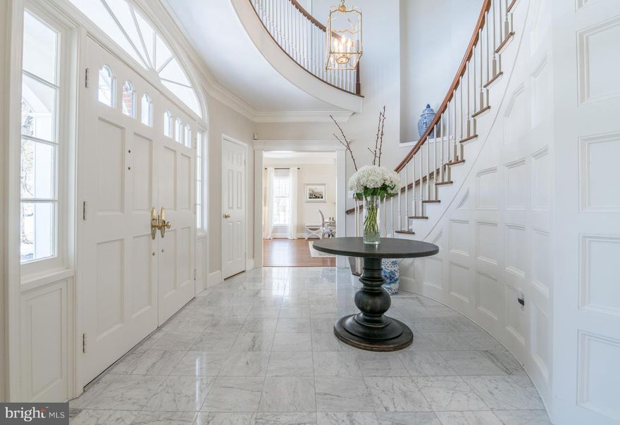 This stately brick colonial is one of a kind! Lush yard w/hardwoods, privacy fence, brick patio. Scene-stealing staircase, marble entry, formal LR w/marble FP. Cook s KIT w/soapstone counters, SS apps & huge island. Master bath w/soaking tub, curated closet space. 1300 sqft basement w/bed & bath ideal for au pair, guest suite. Close to Del Ray, Old Town, DC; shop nearby Bradlee Ctr & play Ft. Ward