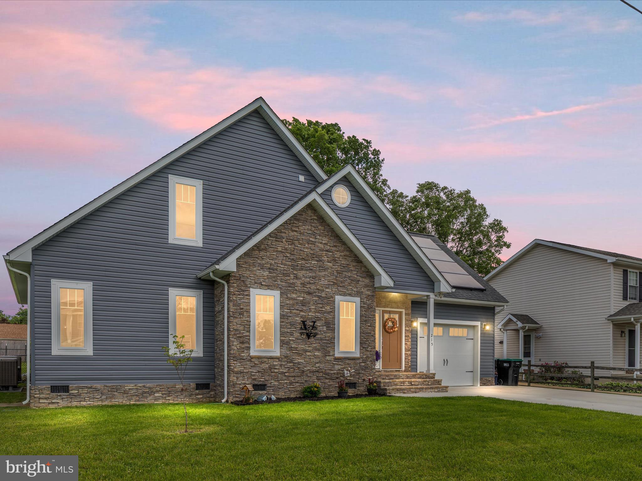 Welcome home to this beautiful 2-story Colonial, thoughtfully built by a local custom builder. Offering 4 bedrooms and 3.5 bathrooms, this home is nestled on a peaceful no-thru street just a short walk from charming Downtown Strasburg — with no HOA to worry about! Inside, you'll find custom ceramic tile flooring and granite countertops in all bathrooms, and luxury vinyl plank flooring throughout the rest of the home. The spacious, open-concept layout is perfect for everyday living and entertaining. The kitchen features granite countertops, stainless steel appliances, an island, and soft-close cabinetry with an upgraded finish. Enjoy the comfort of two primary suites — one on the main level and another upstairs — each with custom walk-in tile showers and walk-in closets. Laundry is conveniently located on the main floor as well, right off the primary suite. Step outside to a fully fenced backyard complete with cozy sitting area and a firepit, ideal for relaxing or hosting friends. Plus, the home includes solar panels for energy efficiency and long-term savings. This move-in-ready gem combines high-end finishes, thoughtful design, and a prime location — a must-see in Strasburg!