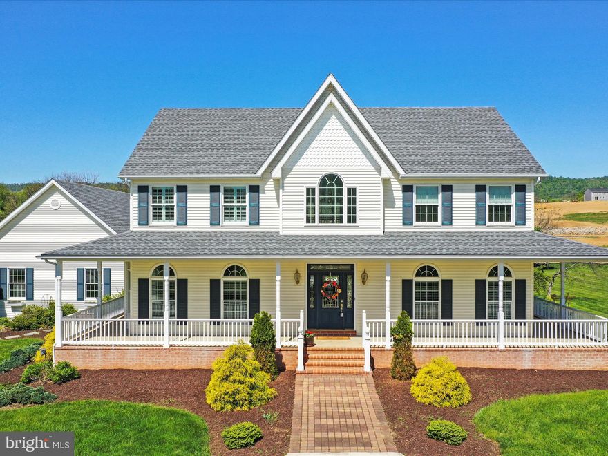 Don't wait to schedule your tour!!!!  Homes in this desirable neighborhood don't often become available.  Situated on 2.48 acres offering 4 bedrooms, 4/1 baths, more than 4500 square feet of quality construction on three finished levels.  The kitchen boasts custom cabinetry, energy efficient appliances and an eat-in breakfast area.  A large family room with a propane fireplace and hardwood floors is centrally located and great for family gatherings. Custom drapes and Hunter Douglas blinds throughout.  The primary ensuite includes a walk-in closet, jacuzzi tub and walk- in shower. Lower level has an abundance  of storage space, a soundproof media room and walk-in cedar closet.  Are you in search of a property that's an outdoor entertainer's dream?  This property is perfectly suited with its gorgeous wrap around porch, circular concrete driveway, exterior lighting, large Trex deck with pergola, outdoor fire pit and stone seating area.  There's also a large open yard area with potential for a swimming pool.  There's more - a 4 car oversized garage including a large workspace, water softener, central vacuum system, new roof in 2021 and new multi-zoned HVAC systems installed in 2022 and 2023.  Home has a monitored security system in place.  This gem won't last!