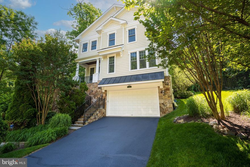 Huge price improvement! OPEN SATURDAY AND SUNDAY 1-4 PM! Welcome to this exceptional home ideal for multi-generational living in the heart of Arlington, VA. Designed for comfort and accessibility, this residence features an elevator and extra-wide doors and hallways, ensuring easy movement for all. Newly installed dual-zone,
energy-efficient gas heating and electric air conditioning. Newly installed 75-gallon water heater.
The entire house was professionally painted inside and out including extensive millwork and trim,
walls, columns, and ceilings, garage floor (new epoxy paint for a strong seal), garage walls and door, New carpet on the lower level. Freshly painted exterior wrought iron handrails, pergola, and fence, freshly sealed asphalt driveway. The sprinkler system keeps the lawn and landscaping fresh. Open kitchen and breakfast room full of natural light features: 42-inch maple raised panel kitchen
wall cabinets; granite countertops paired with 2 under mount sinks, (1 in the island). The kitchen
island features overhead cabinets with glass doors with lights inside and below. Additional
cabinets for extra storage below the island. GE Monogram professional-grade stainless steel
appliances, including a professional grade gas range with a huge overhead vent and lights, 6
burners, griddle, a double plate warmer shelf, Built in self-cleaning double ovens, one large and one
smaller, large side-by-side refrigerator with an ice maker and water dispenser, six cycle dishwasher,
butler’s pantry with ample cabinets with glass doors and lighting inside and under cabinets,
Spacious breakfast room, Family room off kitchen with tall windows, fabulous chandelier, fireplace
and door to back yard. Beautiful mirrored half bath off the pantry.
Relax with music throughout the house with a complete home automation system with integrated
speakers in the basement, main level, primary bedroom, and loft. The main level has ten-foot high
coffered ceilings in the family room, extensive millwork and trim and nine-foot high ceilings on the
remaining levels. The fully finished lower level includes a media or entertainment room with a
fireplace, wet bar, full bath, and an office or bedroom with security windows and a security door to
the stone walled staircase to the backyard. There are tray ceilings in the primary bedroom, living
room, foyer, and breakfast room. Recessed lighting is installed throughout the house. Chair rail and
three-piece crown molding in the living room and foyer. 3.5-inch oak hardwood flooring throughout
the main floor, upper levels 1 & 2 hallway, and bedrooms. Oak staircases leading to the upper level
1 and 2 are illuminated with natural light from the large windows at each landing.
The primary bedroom suite is pre-wired for a ceiling fan and includes closet a lovely sitting room
with an electric fireplace, glass display shelves and wet bar, 2 large walk-in custom closets, a
double door entrance to the primary bath with a large soaking tub, 2 beautiful vanities with lighting
and mirrors that allow views from behind, glass display shelves, a large glass shower and a
separate water closet.
3 fireplaces: Gas fireplaces in the media room and family room with a gas
An electric fireplace in the primary bedroom sitting room.
Bathrooms: Granite countertops and ceramic tile floors in all bathrooms-complemented by
ceramic tile tub and shower surrounds. Other Details: Data/Phone/Cable Wiring and security
prewired. 400-amp electric service, Copper water pipes, Extra-long windows throughout house for
ample natural light.