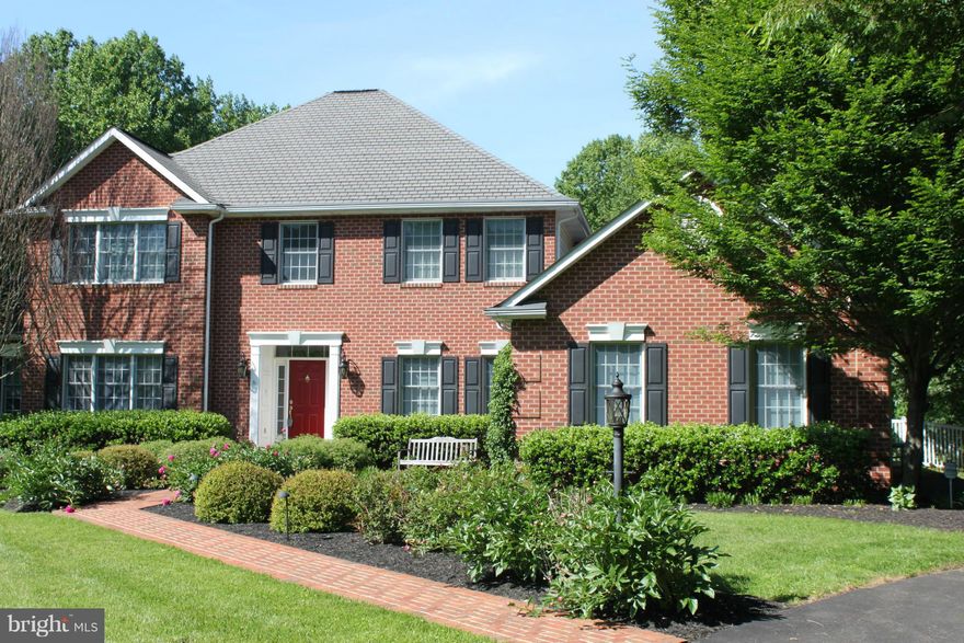 Minuets frm the NCR trail,Hunt Valley, & 4 corners! This Gracious colonial boasts 3 lovely acres, 5 bdrms, 3.5 baths, an open floor plan with great room, 1st floor master, screened porch, trex deck with fire pit & hot tub. In the lower level you will find the awesome theater room & family room. 3 car garage, and a level back yard that backs to private woods make this home a real gem.