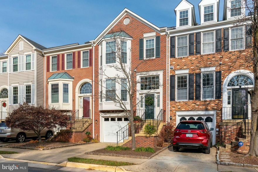 Welcome to this meticulously maintained, spacious home filled with natural light, and lots of upgrades! The large and recently upgraded kitchen features new stainless steel appliances, new granite countertops, upgraded cabinets, and glass tile backsplash, under-cabinet lighting, and hardwood floors. The kitchen boasts ample cabinet and countertop space, as well as a pantry and a large bay window.  All appliances (including the washer/dryer) were replaced in 2017.  The dining room offers space for a table and a buffet.  The living room has hardwood floors and a French door which leads onto a spacious deck. All hardwood floors were refinished in 2009. The carpet was  replaced in 2009 and features upgraded padding. There is a bathroom on every level. The master suite is on its own private level. Open the double doors and see soaring ceilings, a large bay window, and an ensuite bathroom with a glass shower, skylights, granite countertops, ample cabinet space,  and a soaking tub. The master bedroom also features a large walk-in closet and a ceiling fan. The upper level features an additional 2 rooms for use as bedrooms or office space. There is a full bathroom with ceramic tile floors, updated cabinets, and a shower/tub combination also with ceramic tile.  All bedrooms are carpeted. The lower level features a wood burning fireplace and plenty of space for a couch, tv, and exercise equipment. There is a powder room on this level (with updated cabinets) and the laundry room is tucked away behind double doors. The garage is accessible via the lower level. Step outside of the lower level through a sliding glass door that was replaced in 2018, onto a welcoming brick patio, privately fenced in. This beautiful home is located in the heart of Kingstowne in very close proximity to the Kingstowne Town Center (shopping and restaurants), the Van Dorn and Franconia Metro Stations, and walking paths, playground, and tree lined streets. Welcome home!