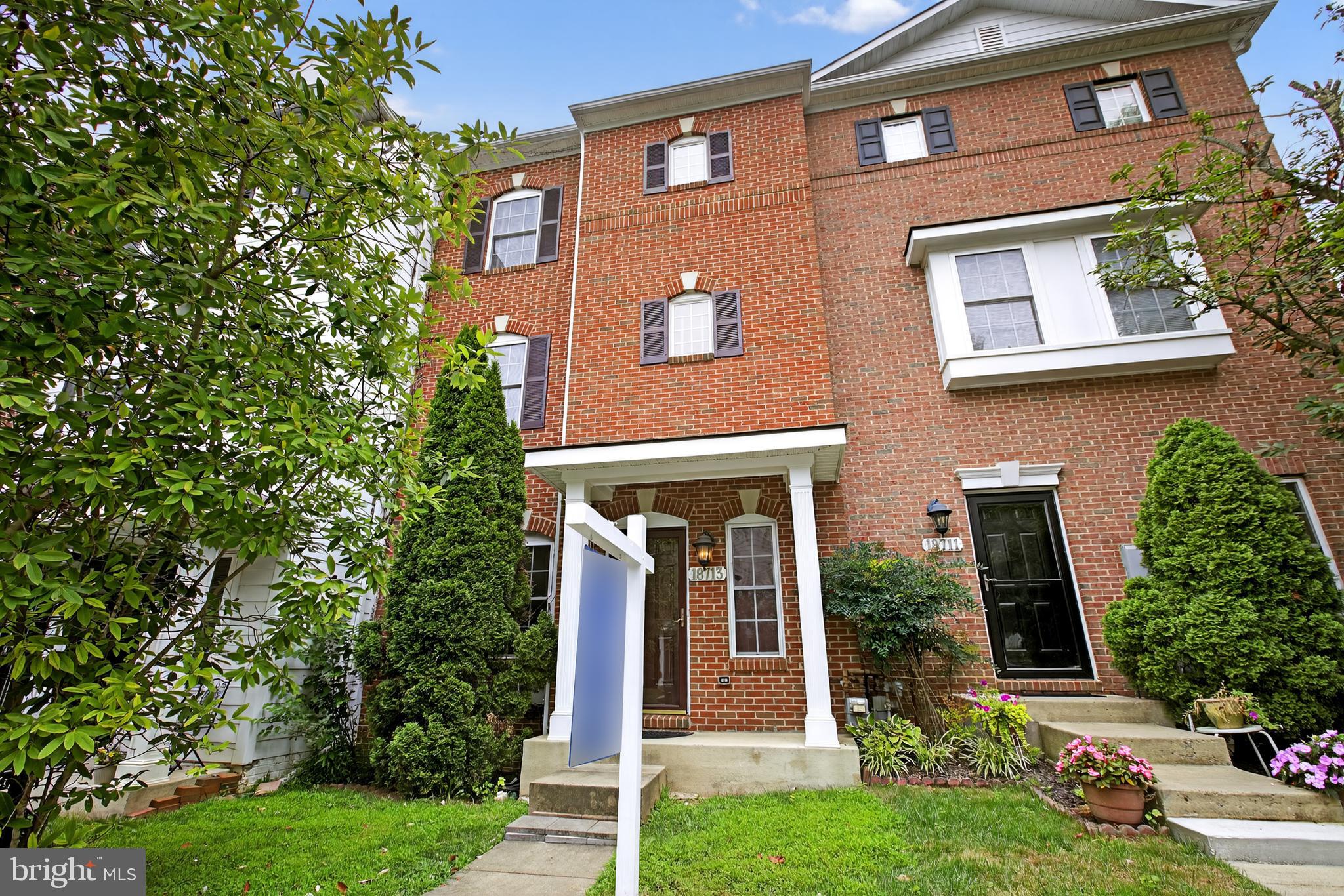 This stunning four-level townhome, built in 2007 and located in the sought-after Whetstone Run neighborhood of Gaithersburg, offers approximately 2,880 square feet of comfortable and versatile living space. The home features four bedrooms and three and a half bathrooms, including a spacious primary suite with a soaking tub and separate shower. The gourmet kitchen is equipped with granite countertops, stainless steel appliances, recessed lighting, and a mix of ceramic tile, hardwood, and carpeted flooring. The main level boasts a full-size living room, formal dining area, and powder room, with direct access to an oversized deck overlooking a fully fenced backyard. The finished lower level includes a family room, fourth bedroom with a full bath, and walkout access to the yard, making it ideal for guests or flexible living needs. Additional highlights include brick and vinyl siding construction, two assigned parking spaces, and a desirable location within Montgomery County Public Schools. Residents also benefit from nearby amenities.