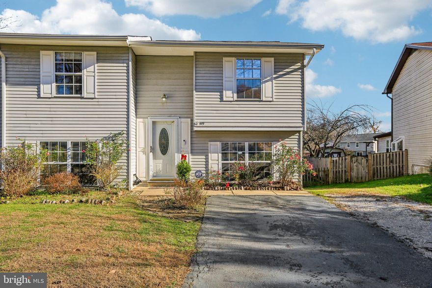 Welcome to this charming four-bedroom, one-and-a-half-bathroom home nestled in the sought-after Revell Downs community. This delightful 1,432 square foot residence spans two thoughtfully finished levels, offering functionality for today's lifestyle.

The heart of the home features a spacious eat-in kitchen, a dedicated laundry and mudroom, while four well-appointed bedrooms provide ample space. The large, fully fenced backyard serves as your private oasis with direct access to open space.

Location enthusiasts will appreciate the home's proximity to exceptional amenities. Sandy Point State Park and the Bay Bridge are just minutes away, offering endless recreational opportunities. Downtown Annapolis, with its historic charm, local marinas, shopping, and dining, is a short drive from your front door. The property is zoned for the highly regarded Broadneck School District.

Adding to the area's appeal, the new Broadneck Peninsula Trail is near completion, creating a paved multi-use path that connects the existing Baltimore and Annapolis Trail directly to Sandy Point State Park. This exciting addition forms part of the national American Discovery Trail, providing seamless outdoor recreation from trail to bay.

Whether you're a first-time buyer, investor, or someone seeking the quintessential Annapolis lifestyle, this home presents an excellent opportunity.