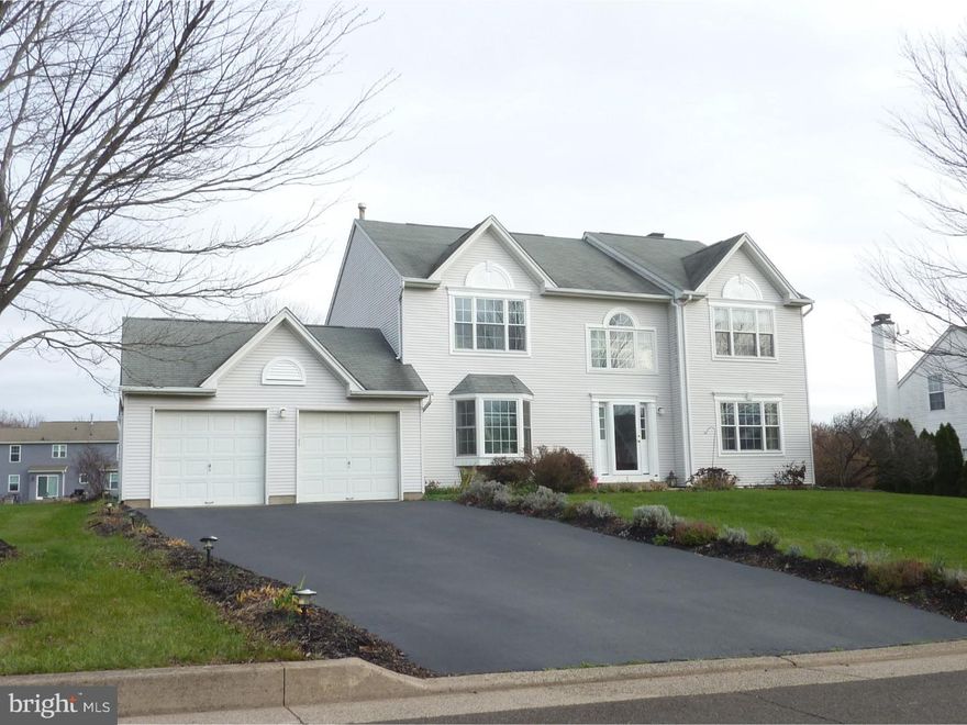 Welcome to 3 Sutton CT a distinctive community of 50 homes in New Haven built by Trafalgar. The Hampton I model is beautifully updated & extremely well maintained four-bedroom Colonial home that is perfectly situated on a premium cul-de-sac lot & part of the award winning Council Rock School District. Enter the two-story foyer with an oak hardwood turned staircase with elegant wrought iron spindles with large windows. Branching off the foyer is your formal dining room & living room, with a bay window & updated bamboo flooring, recessed lights. Porcelain tile floors lead you throughout the main level into the remodeled kitchen with granite counters, glass tile back-splash, updated appliances, center-island, upgraded light fixtures and breakfast room that overlooks the step down family room with wood burning fireplace, tile surround with loads of natural light. The family room also leads out to your free-form Trex deck overlooking your backyard and common space. A powder room, two-car attached garage, laundry room with LG washer & dryer complete the first floor.  Four spacious & open bedrooms highlight the second floor. The Palatial master suite with loads of windows , cathedral ceiling, has a generous sized sitting area, 2 walk-in closets with custom cabinetry, linen closet as well as an additional vanity that  leads into a custom master bath retreat with a large Corian topped vanity & beautiful ceramic tile flooring, frameless shower & soaking bath. The 2nd full bathroom with a tub/shower also uses a Corian countertop, ceramic tile, newer fixtures & updated lightening. The other 3 bedrooms are all generous sized with double closets. The large & cozy finished basement is divided into several areas that can be used for recreation, crafts, storage & gives plenty of additional living space. Energy efficient furnace, air conditioning unit & replacement Marvin low e windows will help you save on both summer cooling and winter heating costs. A commuters' delight only minutes from I-95, Route 1, the Princeton Corridor, the PA Turnpike & various train stations to New York or Philly. Also only a short bike ride or walk to the dining and shopping of charming and historic Newtown Boro. Neutral and tastefully decorated, this home is both beautiful inside and out is a must see in this price range!  Whether it's cozy nights by the winter fire or a balmy summer brunch on the deck, this home offers it all. Be sure to schedule your personal showing soon!