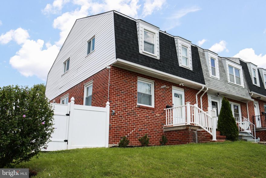 King of the Hill!  This huge end unit townhome sit on top of the hill with an expansive lot that give you a spacious well manicured backyard as well as a paved side-yard.  The entire lot is fenced in with a beautiful and durable vinyl fence that keeps your space private and secure.  There is a two-car parking pad in the back that is secured with a gate.  The pride of ownership for this home will be very visible as you tour this home. 

This freshly-painted 3 bedroom and 2 full bathroom home has been kept in pristine condition with recent upgrades and renovations.  You walk into an open floor plan on the main level with gleaming wood floors and 9 ft ceilings.  The main level includes a spacious living room with crown moldings, a formal dining area, and a vast kitchen with a bar that is ideal for hosting friends and family.  The kitchen contains a suite of stainless steel appliances, granite countertops, plenty of cabinet space, under cabinet lighting with backsplash all around.  The fully finished and inviting lower level includes a large living area, a full bathroom, a couple of storage spaces, long closet that holds the newer front load washer & dryer, gas water heater, and well-maintained furnace system.  There is a private walk-out for the basement that leads to the backyard.  Going up two flights of oak steps, the 2nd level greets with with more gleaming wood flooring,  a wide hall way, two spacious bedrooms, a large primary bedroom and full bathroom.  All rooms have a ceiling fan for energy efficiency and large windows that bring in an energizing amount of natural light into the home.   This home has it all is ready for the next owner.  Schedule a showing to see it today or it will be gone before you know it.