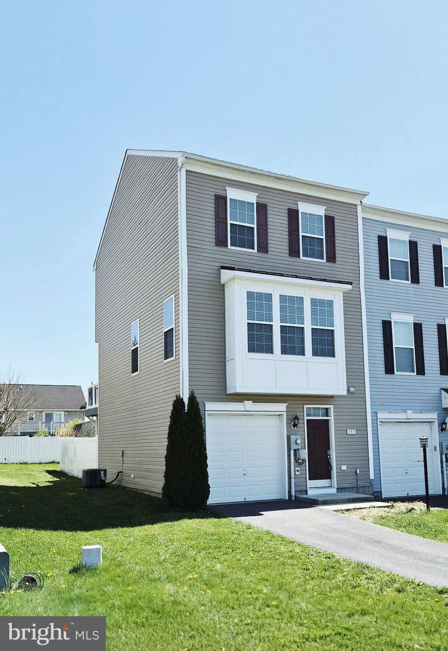 Nestled in the charming Kensington Terrace community, this exquisite end-of-row townhouse offers a perfect blend of modern comfort and classic Colonial style. Built in 2017, this home boasts a well-maintained condition and a thoughtful layout that invites warmth and relaxation. Step inside to discover a spacious interior featuring a combination kitchen and dining area, ideal for both casual meals and entertaining guests that can expand outside to the 160 sqft deck made with maintenance free materials. Equipped with essential stainless-steel appliances, including a dishwasher, microwave, electric oven/range, and refrigerator, this kitchen is designed for convenience and functionality. The home features three generously sized bedrooms, providing ample space for rest and rejuvenation. With two full bathrooms and a convenient half bath, morning routines and guest visits are effortlessly accommodated. The upper-floor laundry adds to the ease of daily living, making chores a breeze. The flooring throughout the home is a harmonious mix of plush carpet and premium engineered wood plank, creating a cozy yet sophisticated atmosphere. Natural light fills the space, enhancing the inviting ambiance. Outside, the corner lot offers a private, fenced rear yard, perfect for outdoor gatherings or simply enjoying a quiet moment in the fresh air. The asphalt driveway provides convenient parking, while additional on-street options are available for guests. Located within a vibrant neighborhood, this home is just a short distance from a commuter rail station and major roadways, making it an ideal choice for those who commute. The community association takes care of common area maintenance, road upkeep, and snow removal, allowing you to enjoy a low-maintenance lifestyle. Kensington Terrace is known for its friendly atmosphere and proximity to local amenities, including shopping, and dining options. This townhouse is more than just a property; it's a place to create lasting memories. Experience the comfort and charm of this lovely home in Kensington Terrace, where every detail has been thoughtfully considered for your enjoyment.