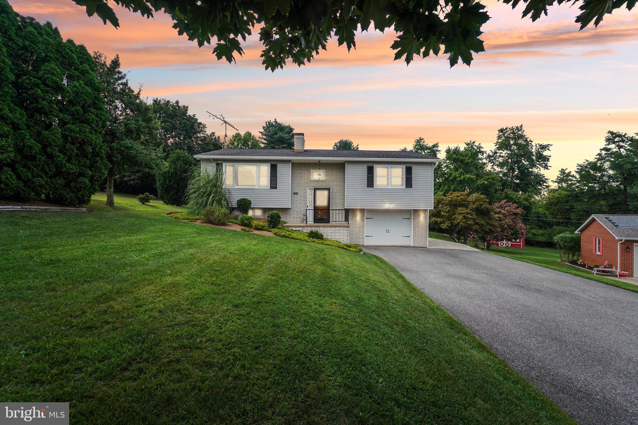 Welcome to Your Renovated Retreat in Thurmont! Step into this beautifully updated home, perfectly situated on an oversized lot of over half an acre. Freshly painted and featuring brand-new flooring throughout, this move-in ready gem also boasts a newer roof (just 3 years old). New heat pump 2022, new water heater in 2024, completely renovated basement 2024, updated kitchen with all new s.s. appliances and granite countertops 2025. Enjoy cozy evenings by one of two wood-burning fireplaces, and take advantage of the versatile bonus room—ideal as a home office, playroom, or potential third bedroom. The spacious yard offers endless outdoor possibilities for gardening, entertaining, or simply relaxing in your own private haven. Don’t miss this unique opportunity to own a charming home with extra space inside and out!