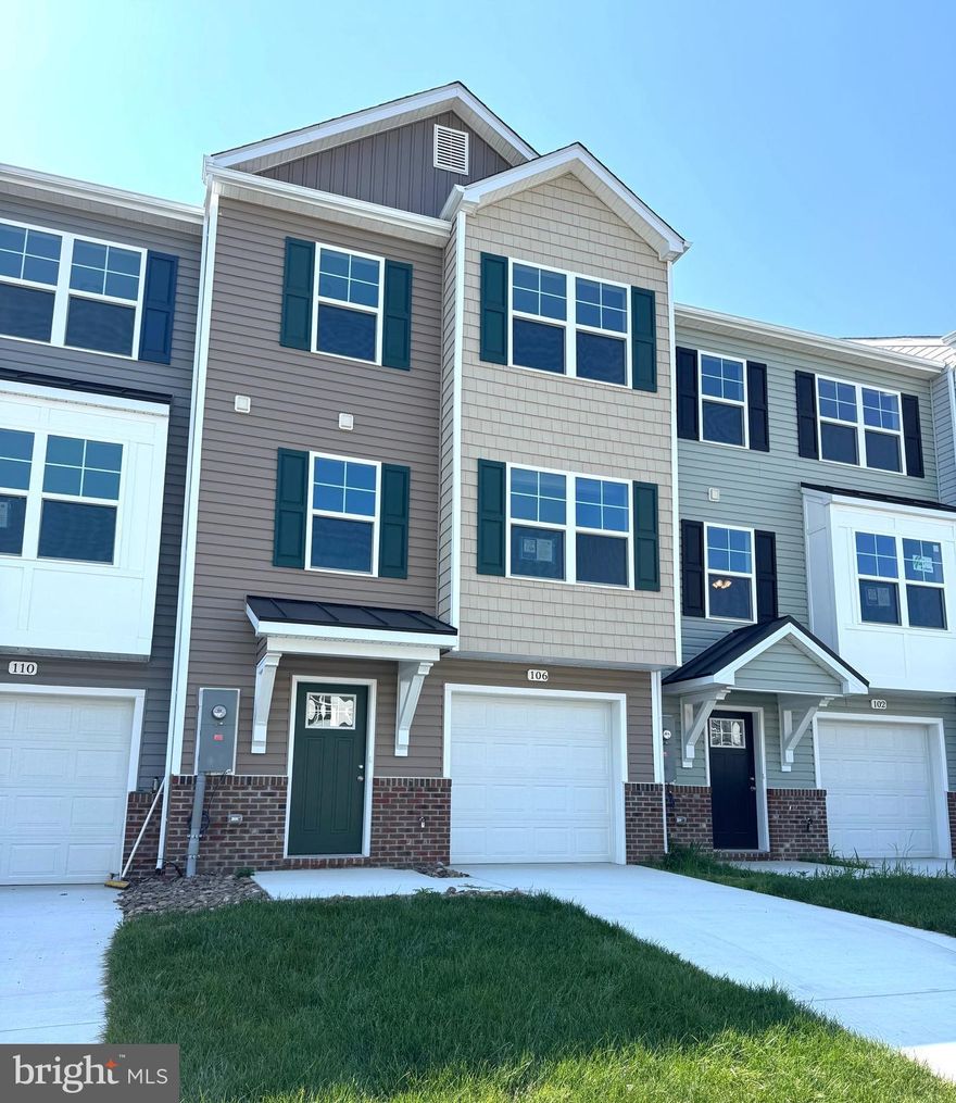 New Town Homes under construction in Heritage Hills featuring 1915 sqft of living space and Natural Gas heating. Home has bump out in main level family room and upper level bedroom, spacious open floor plan, 4 bedrooms/ 3.5 baths, Kitchen with granite countertops, separate island and island bar to family room, stainless steel appliances, and luxury vinyl plank flooring throughout the main level. The upper level primary bedroom has vaulted ceilings, walk in closet, and full bath with tile shower and glass door. The lower level offers 4th bedroom and full bath.  10x12 rear deck, Exterior brick on front, 1-car garage with auto opener, and concrete driveway included.   **interior photos are similar construction**