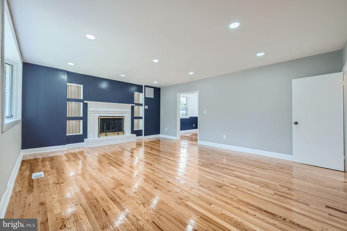 Check out the gleaming hardwood floors at Harwood ave! Beautiful brick is the first thing you notice when you walk up to the house. Harwood floors welcome you when you walk in and a beautiful fireplace with custom shelves surrounding it. Stainless steel appliances are found in the remodeled kitchen. A nice and spacious island allows you to eat in your kitchen. Hardwood floor dining room. Spacious living room, spacious bedrooms, spacious basement with a den and additional fireplace. Remodeled bathrooms. Bathrooms located on every level of the house. Sheds are conveyed as is. Front of houses faces a large open area with trees, perfect to walk your pets or for outdoor activities. Spacious backyard. Easy parking on the street directly in the front of this home. Come and visit this beautiful property and make it your new home.