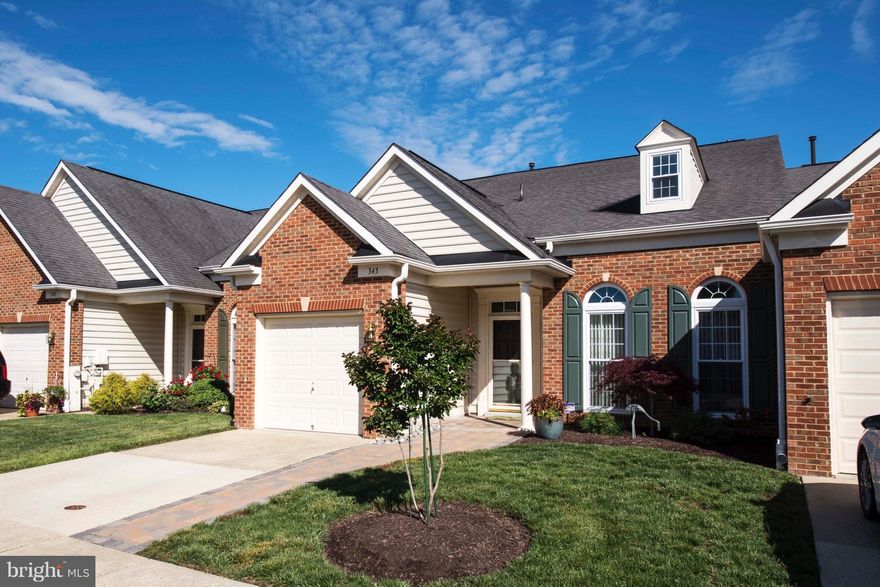 This house will WOW you!  Every space, inside and out, has been improved since 2012/2013--High end finishes--Gourmet Kitchen w/ Island and Custom cabinets--Crown Molding--two-story ceilings--tray ceilings--hardwood floors--Master Bedroom on main level--paver patio w/retractable awning, privacy fence--Gas FP--Very well maintained!!  Walk to shopping, doctor offices, and restaurants.   55+ community