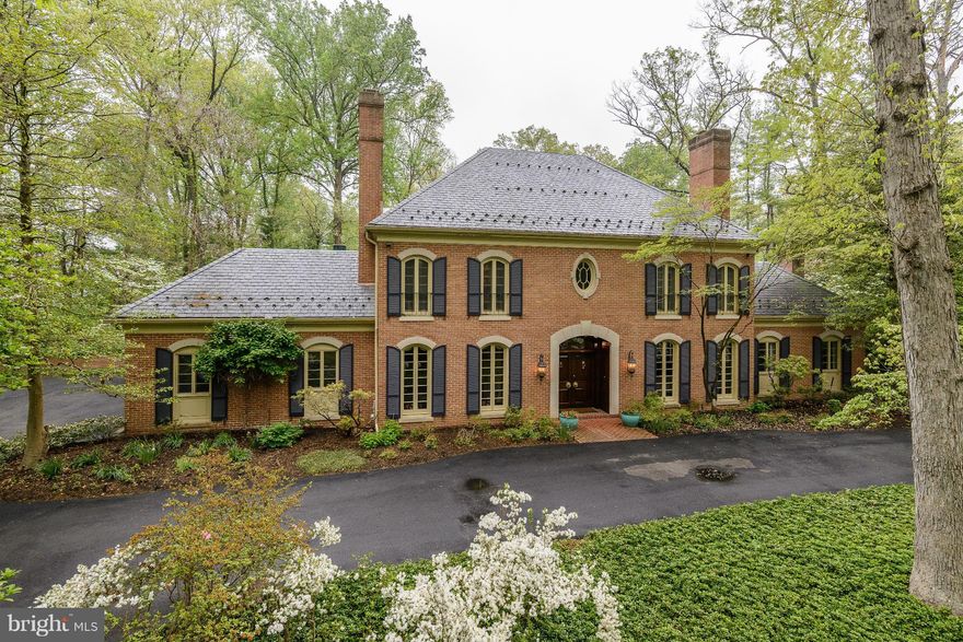 One of my most favorite houses in 30 years of selling! Classic, timeless, custom built, brick colo. w/exceptional curb appeal. Wonderful character & warmth, high ceilings, generously proportioned rm sizes, beautiful details--random width plank flring, a sweeping staircase, extensive moldings. Handsome Library, dramatic all-glass Conservatory. Spectacular 2 ac setting w/pool! Easy access to I-495