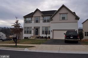 Welcome to this Move-In Ready Colonial Home in Liberty Manor!
This stunning 6-bedroom, 4.5-bathroom residence offers over 4,890 square feet of beautifully finished living space, including a fully finished walkout basement with a complete in-law suite. Built in 2013 and located in the highly sought-after Liberty Manor community in the heart of Woodbridge, this home combines elegance, functionality, and comfort.
Step inside to be greeted by gleaming hardwood floors and a dramatic two-story foyer that sets the tone for the rest of the home. The formal living and dining rooms provide the perfect setting for entertaining guests, while the open-concept layout seamlessly connects the main living areas, creating a warm and inviting atmosphere.
The gourmet kitchen features a large center island, abundant cabinetry, and flows effortlessly into the sunroom—ideal for casual dining or morning coffee. Adjacent to the kitchen is the spacious family room, complete with a cozy gas fireplace and expansive windows that fill the space with natural light.
Step outside to enjoy the designer Trex deck, which includes a staircase leading to a beautifully landscaped backyard and paver patio—perfect for outdoor gatherings.
A private study/office with large windows offers a quiet retreat for work or reading. The oversized mud/laundry room provides convenient access to the two-car garage.
Upstairs, the luxurious owner’s suite features a sitting area, a large walk-in closet, and a spa-inspired bathroom with dual vanities and a separate shower. Four additional generously sized bedrooms and two full bathrooms complete the upper level.
The walk-out lower level includes a spacious recreation room, a kitchenette, a bedroom, a full bathroom, and a bonus room that can be used as a den or additional office space.
Zoned for Charles J. Colgan Sr. High School, this home offers exceptional value in a prime location.
Don’t miss this must-see home—schedule your tour today!