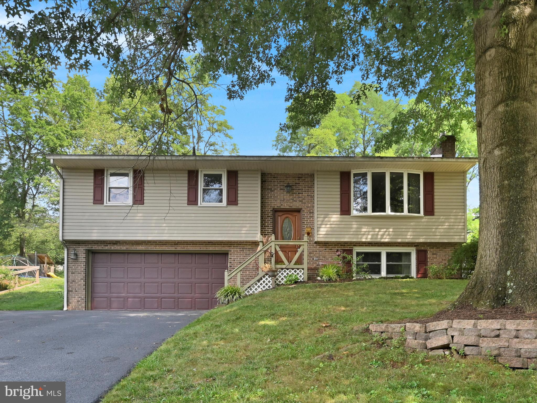 Welcome to this 3-bedroom, 1.5-bath brick home in the Cocalico School District. Offering a blend of comfort and convenience, this home provides a warm and inviting setting for everyday living.
Step inside to find a large bright sunroom addition with vaulted ceilings, the perfect spot to enjoy morning coffee or family dinners. The sunroom opens to a concrete patio, overlooking the spacious backyard—ideal for playtime, gardening, or relaxing evenings outdoors.
The lower level features a cozy living room with a gas fireplace insert, creating a comfortable space for movie nights or gatherings. The open kitchen is equipped with stainless steel appliances, and the oversized garage offers plenty of room for storage, hobbies, or parking.
Set on a sloped lot with a paved driveway, this home also shines in its location. It’s just a short walk to the Reamstown community pool and sits directly across the street from the park—a wonderful bonus for families. Commuters will appreciate the easy access to Route 222 and the PA Turnpike, making travel simple.
With functional living spaces, outdoor enjoyment, and community amenities just steps away, this home is ready to welcome its next owners.