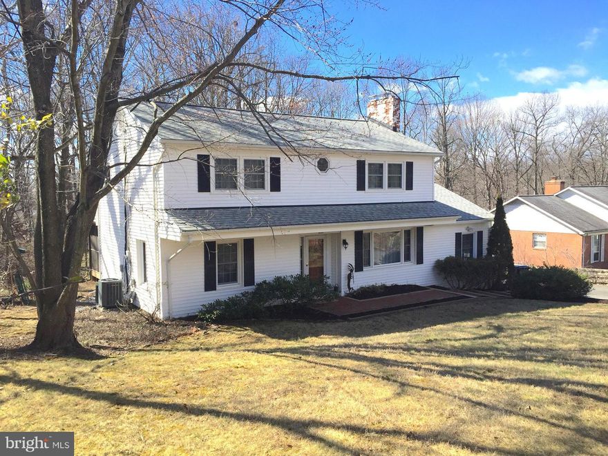 Adjoining the W&OD Trail - Private Wooded Retreat. Centerhall Colonial on 100' x 300' premium .69 acre lot.  Located 1 mile to Dunn Loring METRO & 2 miles from Vienna Town Center.  Close to Rt66, 495 Speedlanes, Mosaic District & Tysons Corner. House in very well maintained condition w newer kitchen w granite counters, cabinets & appliances. Gorgeous 16' x 16' Screened Porch looking out to rear