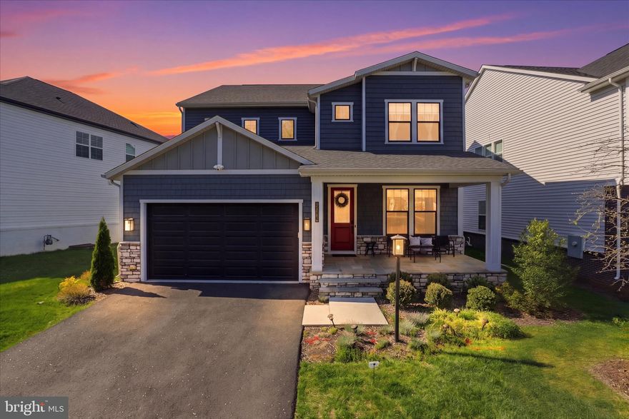 $25,000 PRICE IMPROVEMENT—Welcome to 22773 Orchard Grove Drive. Nestled in the desirable West Park at Brambleton, this stunning contemporary 2 years young TriPointe residence built in late 2023 offers an exquisite blend of luxury and comfort. Many builder upgrades along with $100k post construction upgrades in 2024 by homeowner. Spanning nearly 4,700 square feet, this meticulously crafted home features 6 spacious bedrooms and 5 elegant bathrooms, perfect for both relaxation and entertaining. Step inside to discover an open floor plan that seamlessly connects the gourmet kitchen, complete with upgraded quartz countertops and backsplash, custom lighting package, stainless steel appliances, and a generous island, to the inviting family room adorned with recessed lighting and a newly installed custom cozy electric fireplace. The main level also boasts an entry-level bedroom and full bathroom with a walk-in shower.  The spacious upper level offers 4 bedrooms and 3 bathrooms (all with upgraded walk-in showers and finishes, primary spa like luxury bathroom includes a separate soaking tub).  Custom primary bedroom closet system installed for ease and comfort. The fully finished basement, with walkout stairs, provides additional living space, ideal for a home theater or recreation area, and an additional bedroom with full bathroom. Enjoy the beauty of natural light streaming through double-pane windows, enhancing the home's inviting ambiance. For your enhanced convience and comfort this home has been outfitted with upgraded smart home automations to include light switches, thermostats, door lock and video doorbell, Bluetooth speakers in bathrooms,a and more.  Outside, the property is beautifully landscaped with recently installed underground irrigation system and WiFi controller, featuring a covered porch and rear yard perfect for outdoor gatherings. The 2 car garage has been upgraded with polyaspartic floor coating and pre-wiring for EV charging. Relax on the spacious front porch, and take advantage of the community amenities such as Brambleton Town Center, including a pool, dog park, and bike trails. Conveniently located in a suburban setting, this home is just minutes from commuter lots, Ashburn metro stations, and Dulles International airport, ensuring easy access to local amenities and beyond. With an attached garage and ample driveway parking, this residence is a true gem in a vibrant community. Experience the perfect blend of luxury and lifestyle in this exceptional home.  Don’t miss this incredible opportunity to own this upgraded 2 year young “better than new” residence without any construction delays and best of all no rent back needed allowing for a quick move-in!  **Offers will be reviewed as they are presented.
