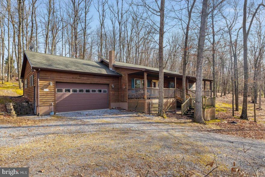 Motivated Seller! Bring all offers!! Gorgeous Property in West Virginia! 

🏡Escape to your private retreat! This charming cedar-sided rancher sits on over 6 acres of serene countryside, offering 3 bedrooms, 2 full bathrooms, and an oversized attached garage. The open floor plan boasts vaulted ceilings and a cozy woodstove, perfect for chilly evenings.

⛰Outside, you'll find a large carport and three storage buildings, providing ample space for vehicles, tools, and equipment. Relax on the 46x6 covered front porch while soaking in breathtaking pasture and mountain views, or step onto the back deck off the dining area—ideal for grilling and outdoor gatherings.

🔑Enjoy unrestricted land in a secluded setting with easy access to Wardensville (under 20 miles) and just 2 hours from Washington, D.C. Whether you're looking for a weekend getaway or a full-time residence, this property offers the best of privacy, nature, and convenience. Easy Drive and no 4x4 required!  Close distance to Short Mountain, Rio Mall and North River (Stocked with Fish)!! Don't miss out—schedule your showing today!