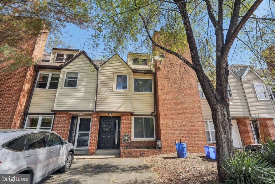 Tucked away on a quiet cul-de-sac in sought-after East Falls, this one-of-a-kind contemporary townhome is a rare find offering exceptional space, privacy, and style. From the moment you enter inside, you'll be impressed by the gleaming hardwood tile flooring and open layout designed for modern living. The inviting main level features a spacious living room with a cozy fireplace—perfect for relaxing evenings. The large eat-in kitchen boasts granite countertops, gas cooking, and plenty of room for a full-size table. Sliders off the dining area lead to your own private back deck and fenced yard, ideal for outdoor entertaining or a quiet morning coffee. Ample closet space and a convenient half bath complete the main level. Upstairs, discover two primary suites with gorgeous bamboo flooring. The front suite boasts custom open built-in shelving and a sleek ensuite with a stall shower. The expansive rear suite is a true retreat with a wood-burning stove, large ensuite bath featuring a soaking tub, walk-in shower, and generous closet space. A hidden gem awaits above: a show-stopping third-floor loft accessed from the rear suite. This versatile space includes its own half bath, built-in counter, custom walled closets, and a walk-in cedar closet—perfect as an additional bedroom, home office, nursery, or creative studio. The possibilities are truly endless. The fully finished basement provides even more flexible living space—ideal for a family room, gym, media area, or guest quarters. Don't miss this rare opportunity to own a distinctive home in a peaceful setting with easy access to Center City, major highways, and all the charm East Falls has to offer.