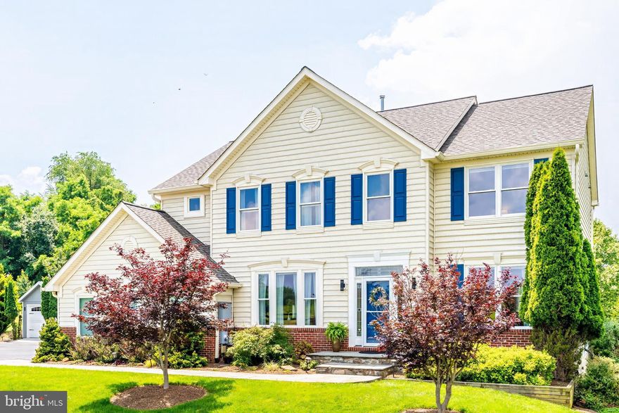 Welcome Home to the sought after Dutchman's Creek Community!  Step into this impeccably maintained Juniper estate, built in 2005 and sited on a lush .93 acre parcel backing serene common grounds, offering rare privacy and tranquility. A graceful stone walkway ushers you onto the inviting front stoop and into a sun drenched interior that features gleaming hardwood floors on both levels, fresh designer paint, and elegant trim work throughout. The home includes four generous bedrooms, four full bathrooms and one half, a formal living and dining suite, an intimate family room anchored by a fireplace, and a spacious study—each space infused with soothing natural light. Outdoors, discover a bespoke entertainment haven: a deck crowned with a pergola, adjacent patio, mature landscaped surroundings, a fenced yard that is secure, and a powered Amish storage shed—perfect for hobbies or overflow. Recent premium updates include a new roof (2023), windows (2017), gutters (August 2024), and dual heat-pump systems and furnace (downstairs: June 2016; upstairs: March 2022 and a backup generator. The newly repaved driveway leads to a hot tub retreat ideal for evening relaxation. Perfectly positioned just minutes from downtown Lovettsville—with its upscale boutiques, restaurants, community center, parks, pool, and recreation complex—and under a ten-minute drive to the MARC commuter train, this residence artfully balances refined country living with distinguished modern comforts. Experience the timeless elegance and elevated lifestyle this exceptional home affords. Schedule your private showing today.