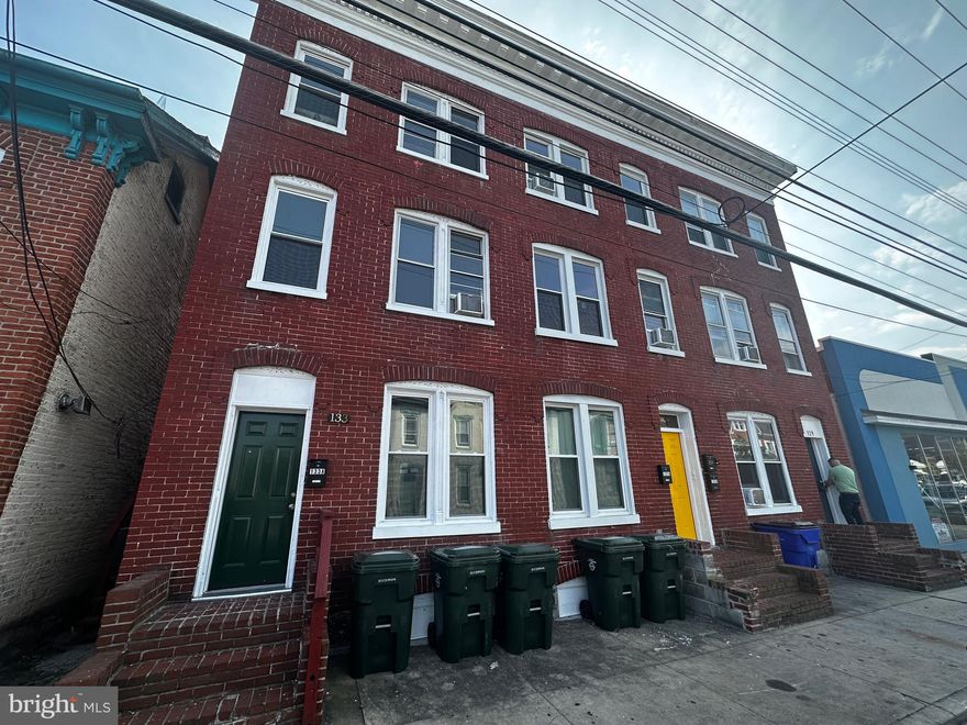 Discover a prime investment in this fully occupied 6-unit apartment building, generating $7,360 per month with low operating costs. Recently renovated, this property features three spacious 2-bedroom units and three large 1-bedroom units, all on a RUBS system, making tenants responsible for their utilities. Situated near downtown Hagerstown, tenants enjoy easy access to all amenities, complemented by a large private parking lot at the rear. This is a seamless, hassle-free investment—simply step in and start managing.