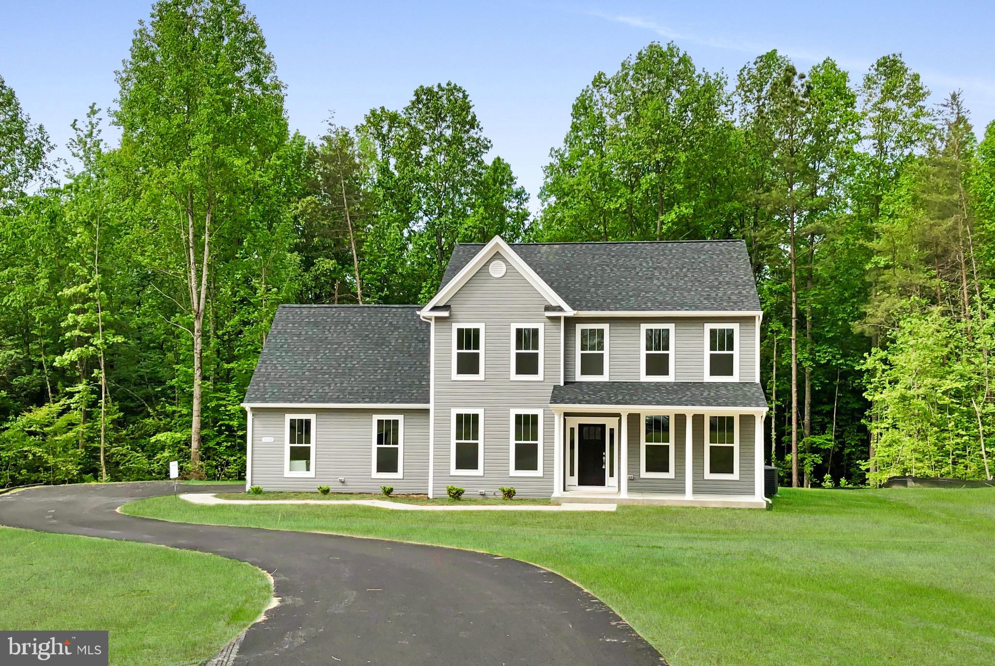 WATER ACCESS! LAKE ANNA- UNDER CONSTRUCTION- FINISHED BASEMENT- Fiberlync High Speed Internet available- 3244 Sq ft - Available early July. Welcome to your forever home! This 4 bedroom Haven, by award-winning builder, Foundation Homes, offers a perfect blend of traditional colonial and craftsman style elements. Step inside from the welcoming front porch into a lovely foyer, flanked by a private flex room with double doors and a spacious dining room leading to the gourmet kitchen. Equipped with high quality shaker-style, white soft close cabinets, stainless steel appliances, quartz countertops, and a large farm stainless sink, this kitchen makes cooking a delight, and the large island leaves plenty of room for eating and gathering. The seamless flow into the eating area, family room, and sun room is illuminated by an abundance of natural light from the oversized windows. The main level features 9-foot smooth ceilings and waterproof luxury vinyl tile, ideal for active families. Oak hardwood stairs lead to the second floor, where you'll find all 4 bedrooms and a convenient laundry room. The owner's suite boasts 2 walk-in closets, a linen closet, and a gorgeous en suite bathroom with double vanities, a soaking tub, and a tile shower. The additional 3 bedrooms provide ample closet space. The finished walk-up basement offers a finished Recreation Room, and finished bath, and a storage room for holiday and keepsake items. A deck will overlook your back yard, providing the tranquility everyone desires. Lands End is a beautiful lake community at Lake Anna and offers a common area with a boat ramp, and boat slips. This home is just minutes by boat or land to Tim's at Lake Anna, mini golf, The Cove, The Tap House, Mineral Farmer's Market, grocery shopping, and more. FiberLync High Speed Internet is available! Don't miss out on this incredible opportunity – make this home yours today! ***Pictures in listing are examples of the home that is under construction, but not exact. Exact chosen selections are in Documents.