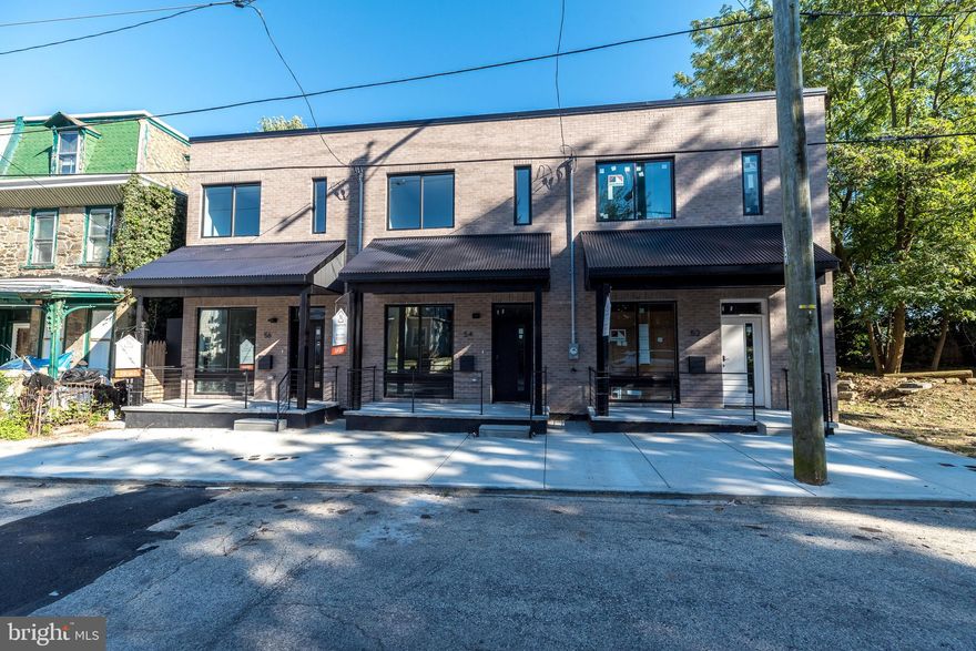 Welcome to 56 E Pastorius Street in the desirable East Germantown section of Philadelphia.  This new construction townhouse features 3 Bedrooms and 2.5 Bathrooms. This end unit townhouse features a spacious living room with an abundance of natural light, oak wood flooring and 10 ft. ceilings throughout the house.  Large eat-in kitchen featuring two tone cabinetry, peninsula marble countertop and stainless steel appliances. From the kitchen you can access your private fenced yard through slider doors. A convenient powder room completes the first floor. Up to the second floor enter the Primary Suite with a spa-like bathroom with step-in shower surrounded with custom marble tiles and double vanity sink. There's also 2 additional large bedrooms and a custom hallway full bathroom. Located on a quiet street in the section of East Germantown. Convenient to Chestnut Hill, Center City, public transportation, major highways, eateries and shopping.
