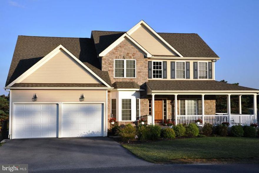 Live at the Lake! 240 Acre lake w/beaches, fishing, boating, club house, and more! Beautiful home approx. 4800 sq. ft., 3 finished levels. Upgrades throughout. Morning Room,  Large Covered Front Porch, Main level den, large family room w/gas fireplace, granite counters, breakfast bar. Jetted tub in Master bath & separate vanities. Master BR w/sitting area & large walk in closet. Owner/Agent