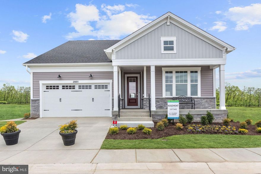 TO BE BUILT.  This is the one you have been waiting for!  The Rosemont is a one-level ranch-style home built by Classic Group starting at $674,900, and designed for entertaining.  Located in the Riverview, a brand new 55+ active adult neighborhood in Two Rivers, everything necessary for daily life is conveniently located on the sunny and spacious main level.  All your guests will feel connected as they gather in the kitchen around a large center island that flows effortlessly into the dining room and great room.  On the main floor, you will enjoy an elegant owner's suite with a luxury bath, a second bedroom with a full bath, and a third bedroom.  The expansive lower level can be personalized to include a recreation room with an optional fireplace and wet bar and a fourth bedroom with a full bath.  Enjoy natural light from windows all around and opt for a deck or screened-in porch to expand your entertaining space.   Walk to Village Club with indoor and outdoor pool, tennis, pickle ball, yoga studio, exercise room, cyber cafe, and more. Open Mon - Fri 10am to 5pm and Sat/Sun 11am to 5pm.  Located 30 min to Annapolis, Baltimore, and Washington DC.  Live at the center it all.  Make your appointment today.  Photos shown are from the decorated model with upgraded landscaping, finished lower level, and other optional upgrades.  Some home sites are subject to lot premiums.  Incentives may vary.  See Sales Manager for details.
