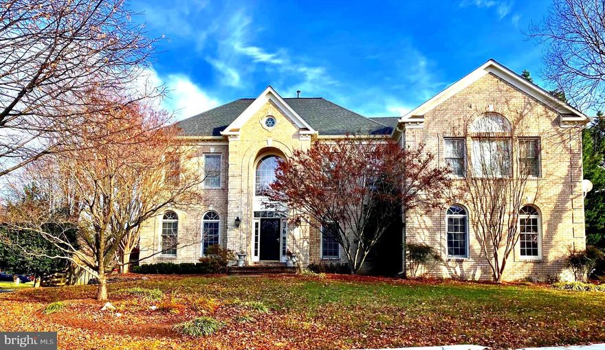 *Professional photos coming 12/ 6*.  This is a captivating home nestled in the sought-after Willows of Potomac community. Boasting 5 bedrooms, 4 and 1/2 bathrooms, and over 6200 sq ft of living space, this impeccably maintained property offers a luxurious living experience.
Upon entry, you'll be welcomed by a grand 2-story foyer that leads to an open, bright, and spacious floor plan. The living room features large windows that bathe the area in natural light, complemented by elegant moldings and hardwood floors. The renovated kitchen is a chef's dream, featuring sleek countertops, professional series stainless steel appliances, a center island, custom cabinetry, a beverage center, a pantry, and a Butler's pantry. The embassy-size dining room and expansive family room with a coffered ceiling and gas-burning fireplace with a stone surround add to the home's allure. Additionally, a private home office with custom built-ins and ample space for two remote workers completes the main level.
The primary bedroom serves as a serene retreat, complete with a luxurious en-suite bathroom, coffee bar, and two generous walk-in closets. The additional bedrooms are well-appointed, ideal for accommodating family members or guests. The lower level offers high ceilings, a spacious recreation room with a fireplace, ample storage, a second home office/den, and an exit to the exterior.
Outside, you'll find a private backyard, perfect for entertaining or relaxing. The outdoor space is well-suited for al fresco dining, gardening, or simply basking in the sunshine. Situated in the heart of the neighborhood, this home is just moments away from the community pool, tennis courts, basketball courts, and an exercise room. Its convenient location also provides easy access to shopping, restaurants, medical care, major highways, and public transportation.
This remarkable property presents an exceptional opportunity to embrace a beautiful new home in a desirable community.