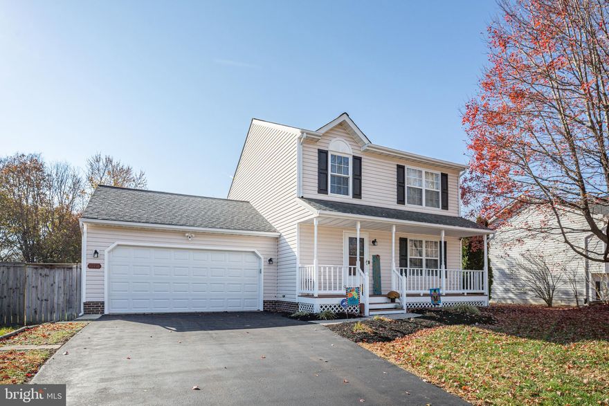 Welcome to this contemporary home in the heart of Spotsylvania County! As you pull up into the newly sealed driveway you will be greeted by the gorgeous front porch and two car garage. This seller has put so much love into this home and it's ready for you to make your own! The foyer features durable bamboo flooring as you greet guests at the front door. Tuck your coats into the front closet before starting your visit. Then step into the spacious family room which has plush carpeting and sunny windows. The dining room is adjacent to the family room and opens onto a newly stained deck with a view that goes on and on. This large 1/3 acre lot has room for all your 'toys' and is the perfect gathering space for guests! The partially fenced backyard provides lots of room for playing and relaxing. Imagine barbecues, a fire pit, and fun gatherings here with plenty of room to enjoy multiple activities. The kitchen has stainless steel appliances and table space for informal meals at home. The washer and dryer with built in cabinets for storage are tucked away in the closet in the kitchen. The perfect guest half bath and utility closet are in the hallway to the spacious garage. The garage has ample parking for two vehicles, additional storage space including wall shelving, and a side door that leads to the backyard. Head upstairs and check out the bedrooms! The primary bedroom has a great view of the front lawn and features a nice, organized walk-in closet with a built in cabinet for linens or clothes. The ensuite bathroom has a luxurious soaking tub, stall shower, and double vanity with room for your toiletries. The other two bedrooms have generous closets and offer great views of the backyard -- these two bedrooms share the hall bath.  Ceiling fans have been installed in all the bedrooms for your comfort, too. One of our favorite spots is on the front porch which is ready for holiday decorating! This neighborhood is tucked away but just minutes from shopping (a new Publix will be open in 2024), shopping, medical facilities, schools (Riverbend H.S.) , commuter lots, and not far from I-95 and downtown Fredericksburg. Newer roof, with architectural shingles, vinyl windows, custom blinds,  interior and exterior updated lighting fixtures, and regular maintenance in this home make it extra special. It is in excellent condition so  see this gem today and you can be in before the new year!