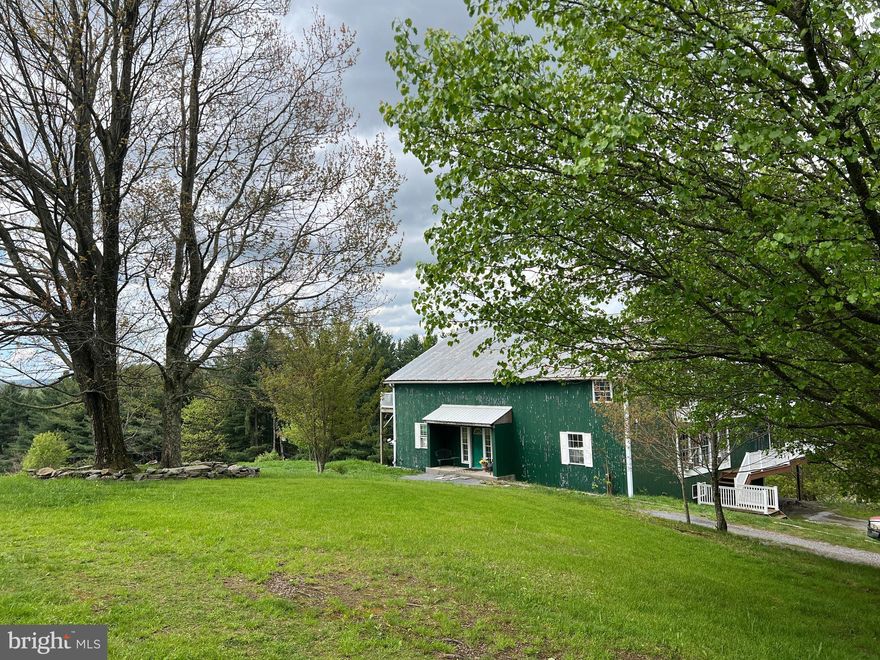 Rare Investment Opportunity Near Deep Creek Lake & Savage River State Park!

Discover the perfect blend of personal getaway and income-producing property with this exceptional offering on over 6 acres of scenic land featuring stunning mountain views. Just a short drive to Deep Creek Lake and all its year-round attractions, this well-maintained property includes four rental units across two detached buildings, ideal for long-term rental income, vacation rentals, or even a charming bed and breakfast.

One of the standout features is a beautifully built, one-bedroom with a loft, log cabin (2005), freshly stained and full of rustic charm. The second structure, over 6,000 sq. ft., houses three additional rental units, all with a strong long-term rental history. Each unit enjoys beautiful views, ample storage, and some include cathedral ceilings and radiant heated floors in a cozy glass-enclosed porch.

Additional highlights include:
New well system
Spacious workshop in basement (potential for conversion to a 5th unit)
Abundant closet space and storage throughout
Proximity to hiking, fishing, boating, and all DCL activities

Whether you're looking for a peaceful retreat with income potential or a smart investment that allows you to vacation at Deep Creek while your property works for you—this is the opportunity you’ve been waiting for.

Please note: Due to tenant occupancy, interior photos are not currently available. 24-hour notice required for showings.

Call today to schedule your private tour!