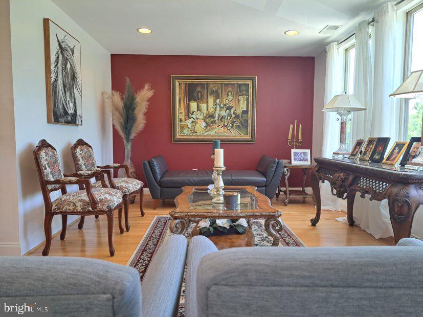The move-out is scheduled for 06/30/2025 and should be ready after cleaning.
Experience contemporary elegance. It is a rare gem that effortlessly blends sophistication with functionality. This townhome offers an open floor plan with 10-foot ceilings, bathing the top level in natural light. Hardwood flooring graces multiple levels, while the gourmet kitchen impresses with stainless steel appliances and a spacious island. Adjacent to the kitchen, a cozy family room with a gas fireplace awaits. The owner's suite boasts ample space and a walk-in closet, while the finished basement includes a rec room and an extra bedroom/office. Outside, a delightful deck overlooks trees and a shared space. The Brambleton community provides a wealth of amenities, including shopping, movies, restaurants, pools, walking paths, and sports courts.
