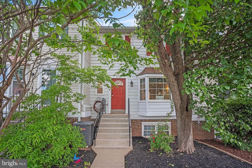 OPEN HOUSE CANCELED! Owners have accepted an offer. This beautifully updated, chic home in desirable Winding Brook is sure to impress and is ready for your immediate enjoyment! You'll love its modern features and easy flow, showcasing a new contemporary kitchen with sleek white cabinetry, new appliances, gleaming quartzite countertops and modern lighting. A wood burning fireplace, inviting dining and living spaces, newer windows, hardwood floors throughout and a main level powder room provide total convenience and leave nothing left to improve! For you private outdoor enjoyment this home boasts a main level balcony as well as a lower level fenced patio, with storage shed included! Upstairs you'll find three well-proportioned bedrooms, generous closet spaces and two completely remodeled full bathrooms that will undoubtedly wow you. This home also boasts a newer washer and dryer, plenty of storage space and full access to  Winding Brook's coveted neighborhood amenities: a large swimming pool, a newly upgraded clubhouse, playgrounds, tennis courts and generous common walking and gathering areas, all included within in a very reasonable monthly fee. (Also included are water/sewer and private snow and trash removal services.) This home also features two dedicated passes for preferred parking right out front, and ample additional parking is available for your guests. This conveniently located home is situated minutes from your shopping and dining favorites, less than 10 miles from Dulles Airport, and a stone's throw from Routes 50 and 66, the Fairfax Co Parkway and other major roadways. Don't miss this one-of-a-kind, delightful home!