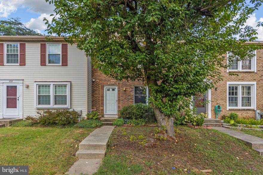 Experience exceptional living in this beautifully maintained center unit townhouse with a classic brick exterior. Featuring 3 finished levels, this home offers a freshly painted interior, new carpet, and a well-appointed floorplan designed for comfort and style.

The large kitchen/dining area is perfect for gatherings, boasting stainless steel appliances, granite countertops, and gleaming hardwood floors in the living room. Enjoy the privacy of a fenced yard, ideal for outdoor entertaining.

Conveniently located near major roads, schools, and shopping, this townhouse combines the best of suburban tranquility and urban accessibility. Don't miss the opportunity to make this stunning home yours!
Property is being sold AS IS.