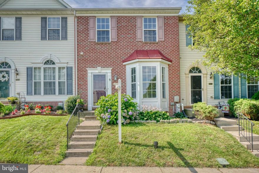 Large Brick front townhome in sought after Greenbrier Hills Community. Enter through the inviting foyer with large coat closet and half bath before stepping up to the oversized living room, then onto the side by side open dining room and kitchen plus bonus sunroom leading to the deck and fully fenced rear yard. There are 3 bedrooms and 2 full baths on the upper level.  The lower level includes a large family room with gas fireplace plus a full bath.  There is a large storage room that is ready to finish to become and office or 4th bedroom. This home is move in ready! Homeowners association includes access to the pool, clubhouse, exercise room and tot lot just steps away. Home sold AS/IS- estate sale.