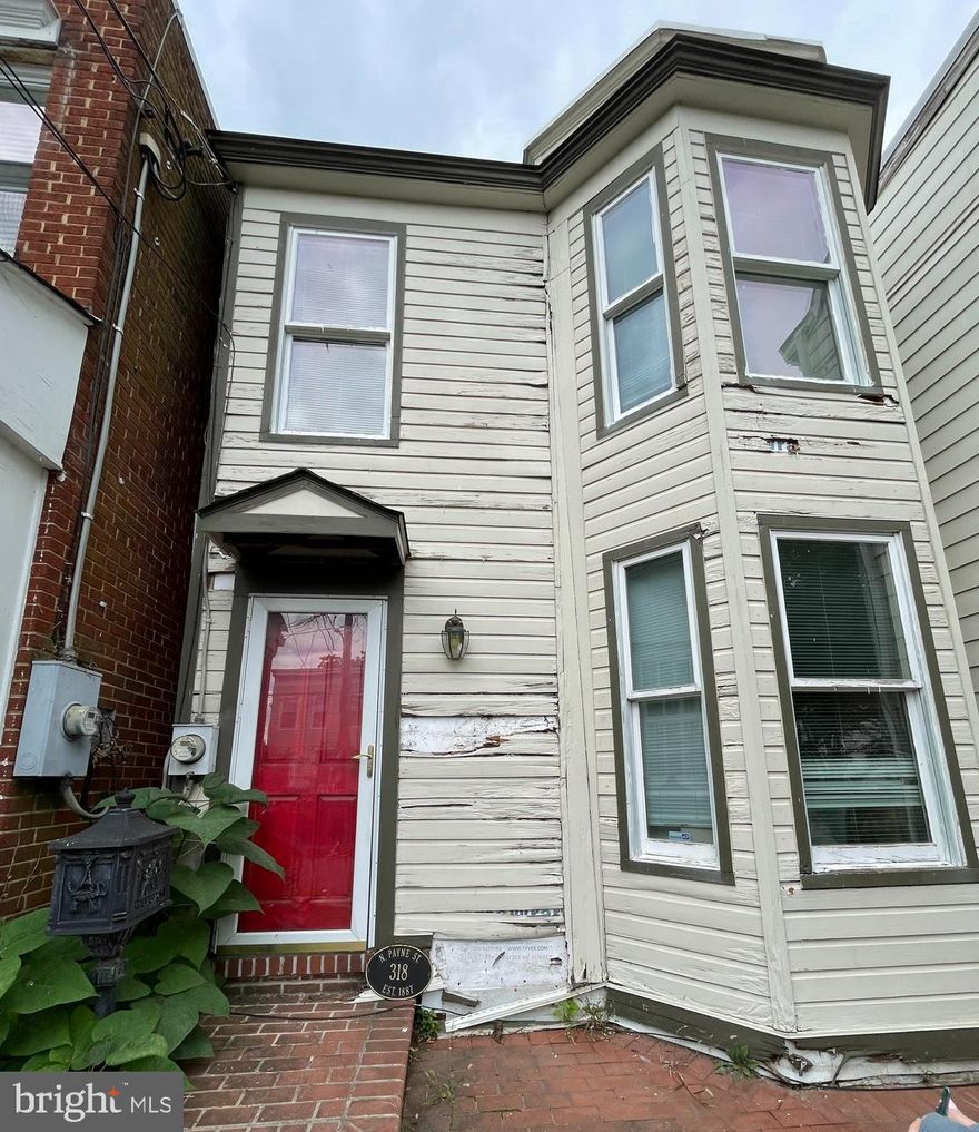 c. 1920 detached dwelling, Lot est. 1883.  Property located in historic Parker-Gray Neighborhood, blocks from King Street.   Extensive hardscaping in front yard with wood deck and shed in rear yard, and 1 parking space at the back of lot accessible via back alley.   2 Bedrooms and 1 full bathroom upper level.  Main level Entry foyer opens to  Living Room/Dining room combo space that leads to rear galley-style Kitchen.   Kitchen has back door that leads to rear yard deck and open space.   1 roughed-in  Full Bathroom on main level.    Plat/survey on order.  Estate Sale; Structure needs major rehab - cannot occupy; Investor special;  Cash only financing.  Seller has right to final decision on any offers.