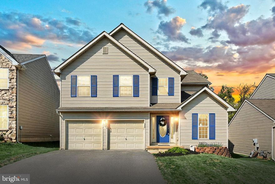 Welcome to this beautifully updated Colonial-style home nestled in the sought-after Chatham Creek community of Windsor Township. This spacious residence boasts 4 bedrooms, 2 full bathrooms, and 2 half bathrooms, offering ample space for comfortable living. Enjoy brand-new luxury vinyl plank flooring and plush carpeting throughout, complemented by a fresh coat of paint that enhances the home's modern appeal. The eat-in kitchen seamlessly flows into the living room, creating an open-concept space perfect for entertaining. It features  a separate formal dining room for special occasions. Relax by the fireplace in the inviting living area, ideal for gatherings and cozy evenings. The fully finished basement provides additional living space, perfect for a home office, gym, or recreation room. Step out onto the deck to enjoy outdoor dining or simply unwind in the serene backyard setting. Chatham Creek offers a range of family-friendly amenities, including two tot lots/playgrounds for children to enjoy, a basketball court and a picnic pavilion for community gatherings, and over a mile of scenic walking and running trails for outdoor enthusiasts. Don’t miss the opportunity to own this move-in-ready home in a vibrant community. Schedule your private tour today and experience all that 645 Thomas Armor Drive has to offer!