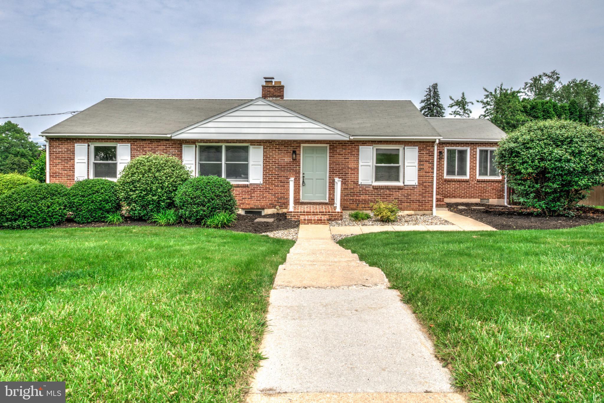 This beautifully renovated 3-bedroom, 1-bathroom rancher is a must-see, blending comfort, style, and functionality throughout. Step inside to stunning hardwood floors that run seamlessly across the main level. The spacious living room features a cozy fireplace, perfect for relaxing evenings, while the adjacent dining room offers a great space for entertaining. The fully updated kitchen is a true showcase with sleek white cabinetry, quartz countertops, a stylish tiled backsplash, modern stainless-steel appliances, and a matching stainless-steel sink—perfect for any home chef. A true highlight of the home is the inviting sunroom, featuring exposed brick walls and abundant natural light from multiple windows—an ideal space to unwind or enjoy your morning coffee. The main level includes three generously sized bedrooms and a fully renovated modern bathroom with tiled walls and flooring, recessed lighting, and a sleek shower/tub combo. Downstairs, the finished lower level boasts a spacious bonus living area with plush new carpet, offering a versatile space for a family room, home office, or entertainment area. Additional storage rooms and access to the basement garage add extra convenience. Outside, you'll find both a spacious front and back yard, with the backyard including a fenced-in area, perfect for pets or outdoor gatherings. Located just minutes from downtown York and with easy access to I-83, this home is nestled in a peaceful, friendly neighborhood that combines convenience and tranquility. With thoughtful updates and a prime location, this home won’t stay on the market long—book your showing today!